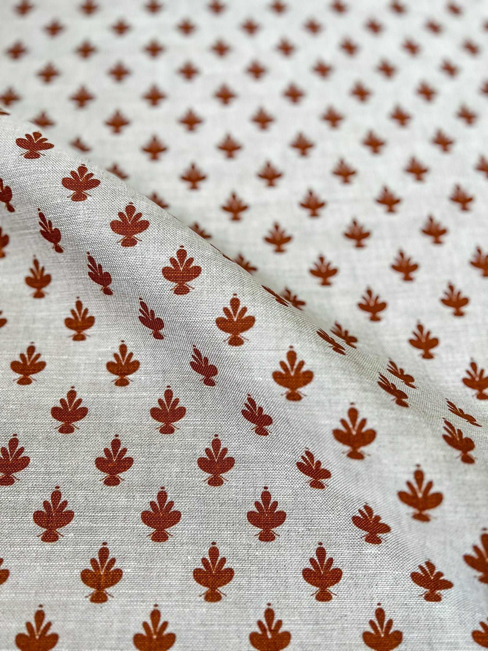 Adeline botanical print by Greige Textiles — inspired by the elegant Jane Magnolia flower, with elliptical curves and soft symmetry on Belgian linen.