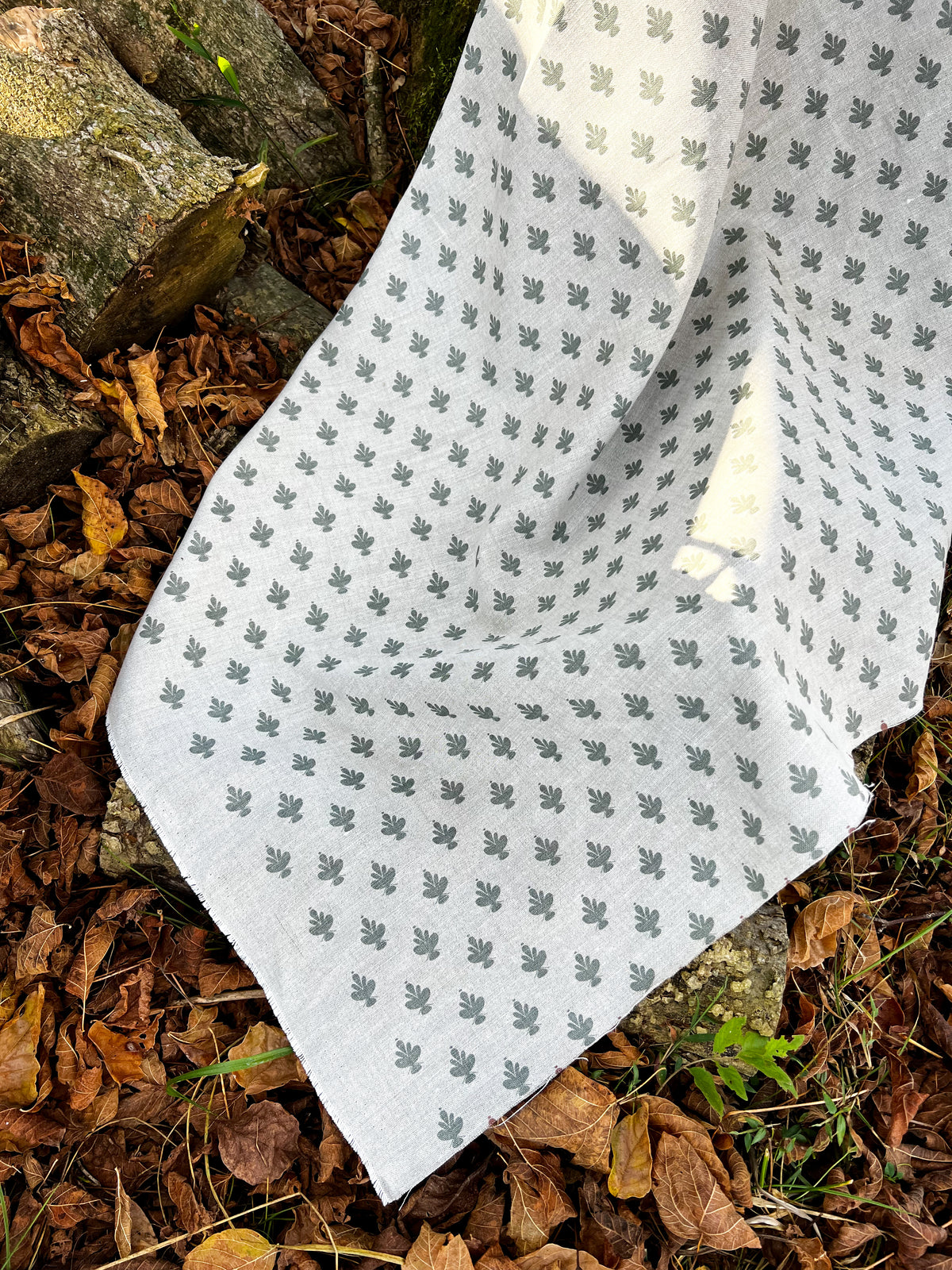 Adeline botanical textile — showcasing Jane Magnolia flowers with graceful detail and soft, symmetrical petals, screen printed on linen.