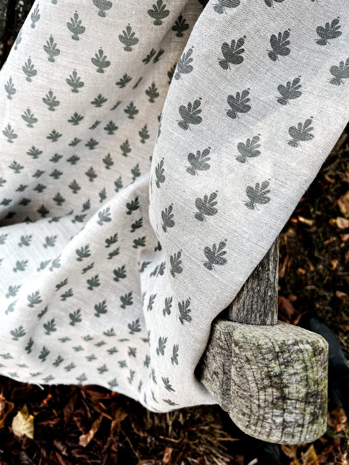 Adeline botanical textile showcasing Jane Magnolia flowers with graceful detail and soft, symmetrical petals, screen printed on linen. Elevate your home with Greige Textiles&#39; lively collection of hand screen-printed linen fabrics and artisan wallpapers.