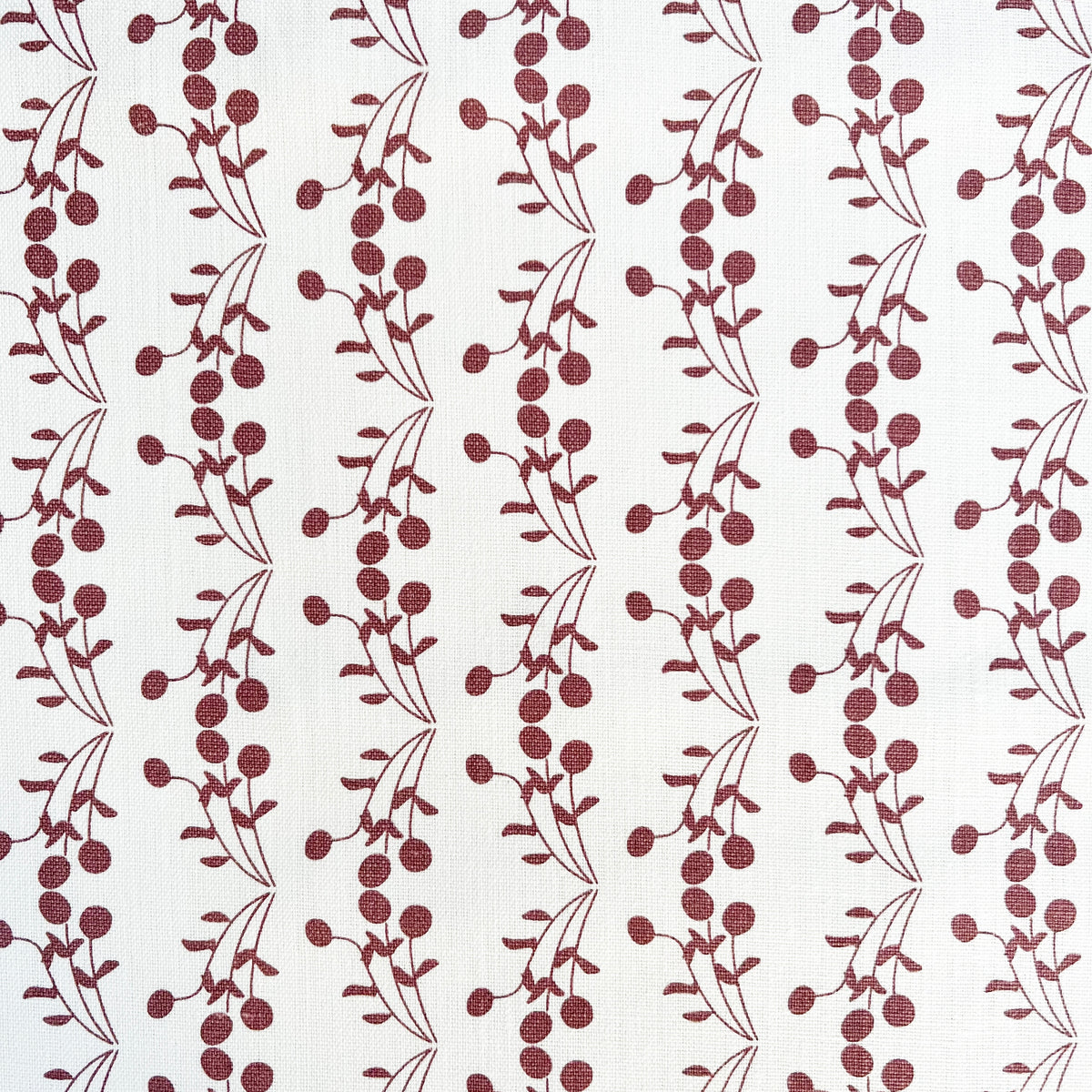 Bernadette fabric — a whimsical botanical print on Belgian linen, ideal for layering into interior spaces as curtains, accent cushions, or decorative upholstery.