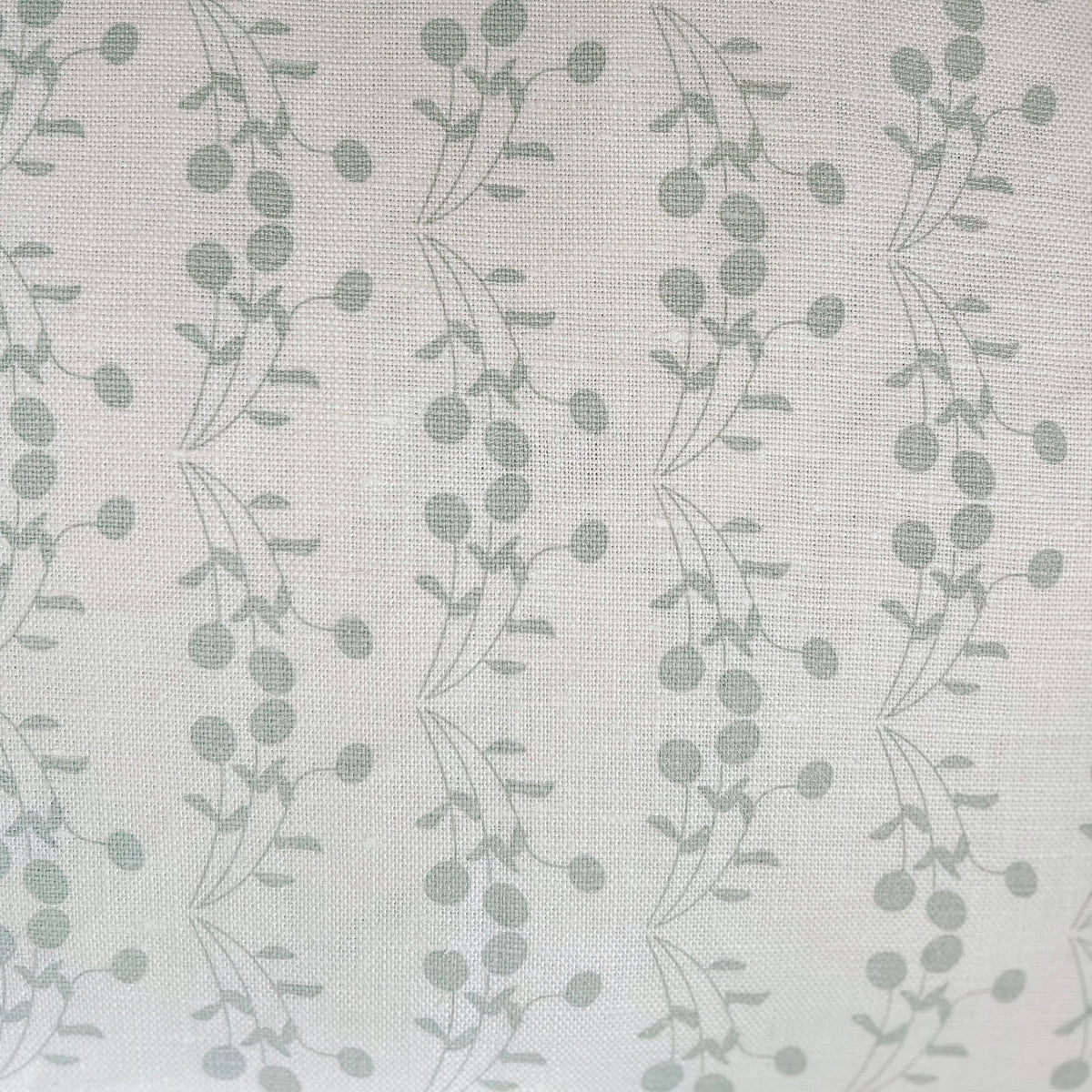 Hand-printed Bernadette textile — a soft, fruit-inspired botanical pattern suited for use in custom drapery, pillows, and residential upholstery.