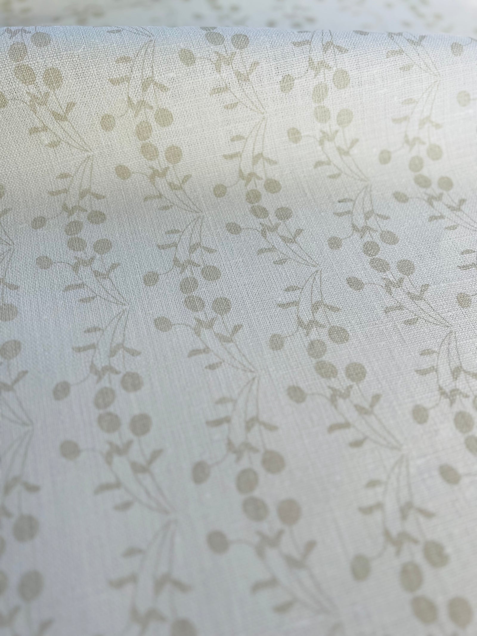 Hand-printed Bernadette textile — a soft, fruit-inspired botanical pattern suited for use in custom drapery, pillows, and residential upholstery.