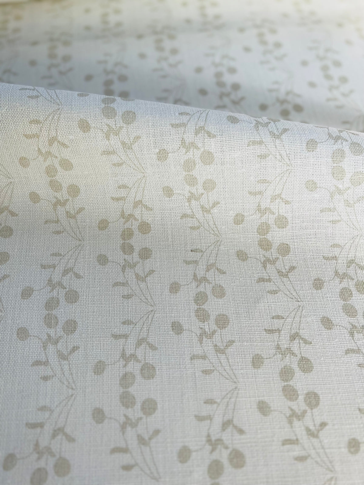 Hand-printed Bernadette textile — a soft, fruit-inspired botanical pattern suited for use in custom drapery, pillows, and residential upholstery.