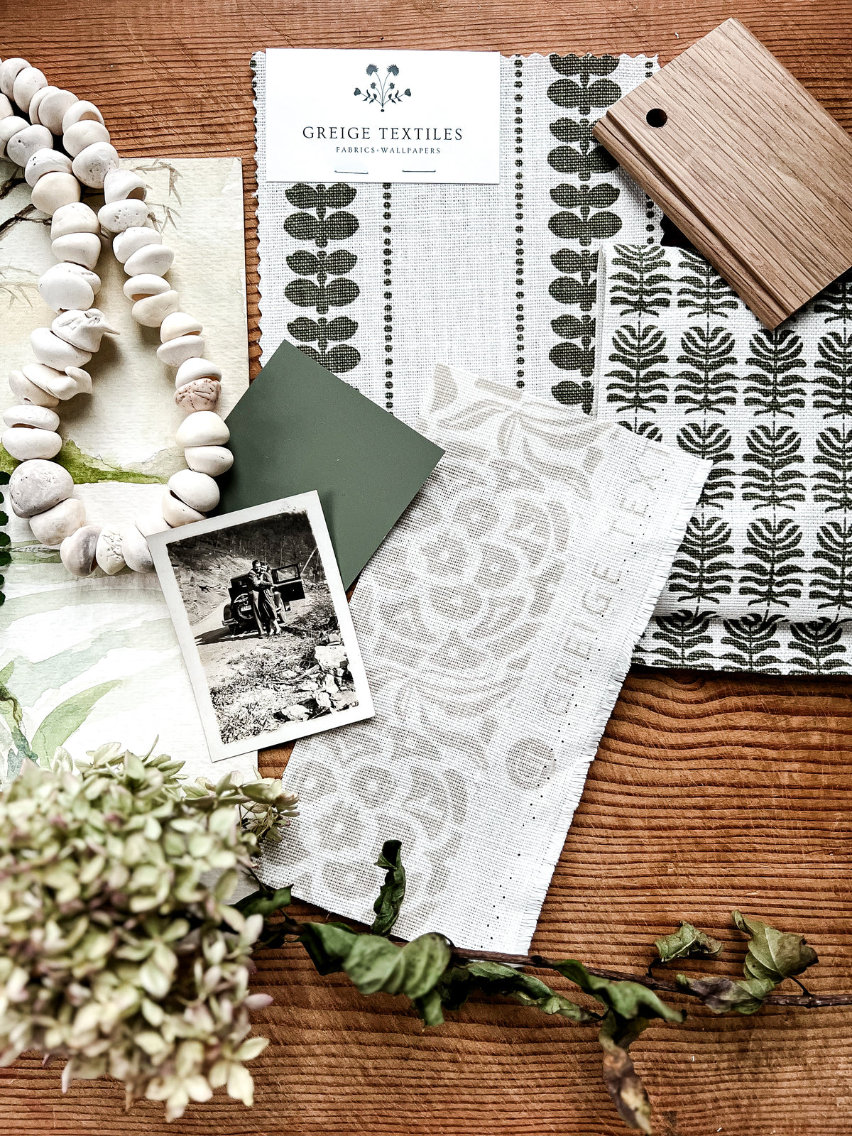 Clara floral print by Greige Textiles — combining timeless botanical motifs with soft cottage heritage charm, artisan printed on linen. Shown with Elodie and Ida