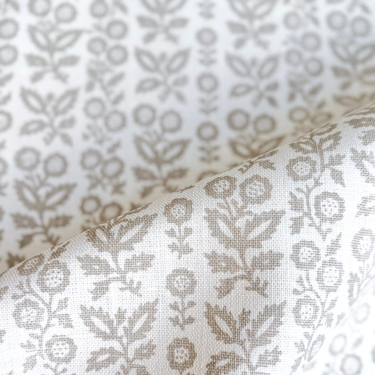 Clementine’s inspiration is drawn from the cover of a vintage book discovered along Portobello Road, creating a sense of understated history. Its delicate composition feels storied yet refined, like a well-loved heirloom reimagined for modern spaces.