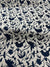 Greige Textiles’ Eliza pattern — an expressive floral and bird motif, screen printed on natural Belgian linen for timeless appeal. Blue on Linen.