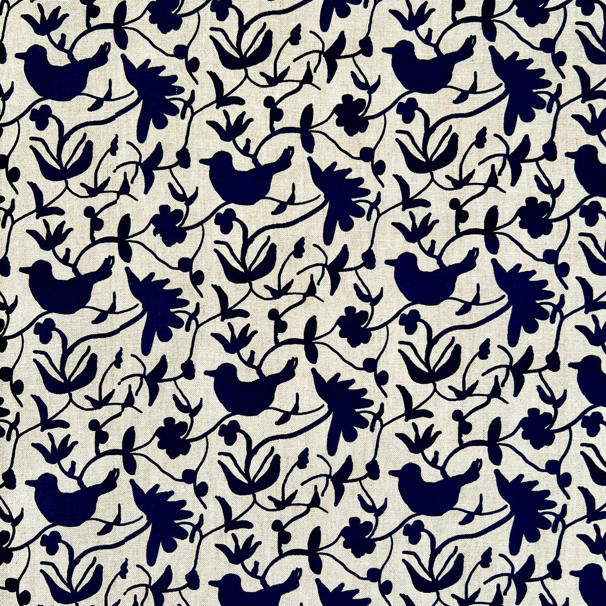 Greige Textiles’ Eliza pattern — an expressive floral and bird motif, screen printed on natural Belgian linen for timeless appeal.