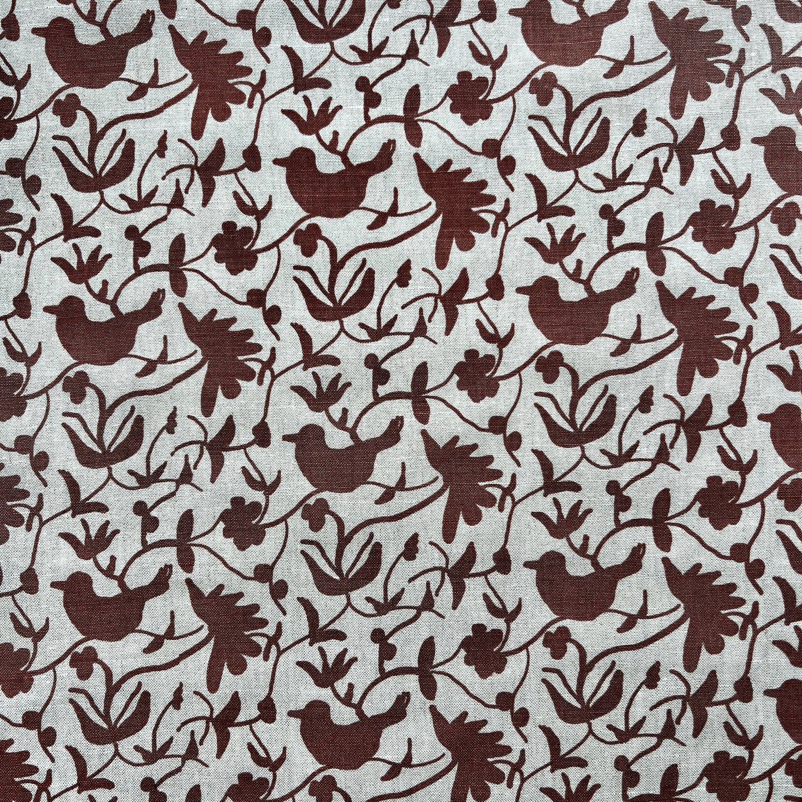 Eliza pattern by Greige Textiles — a hand-drawn botanical design featuring stylized florals and birds, printed on Belgian linen.