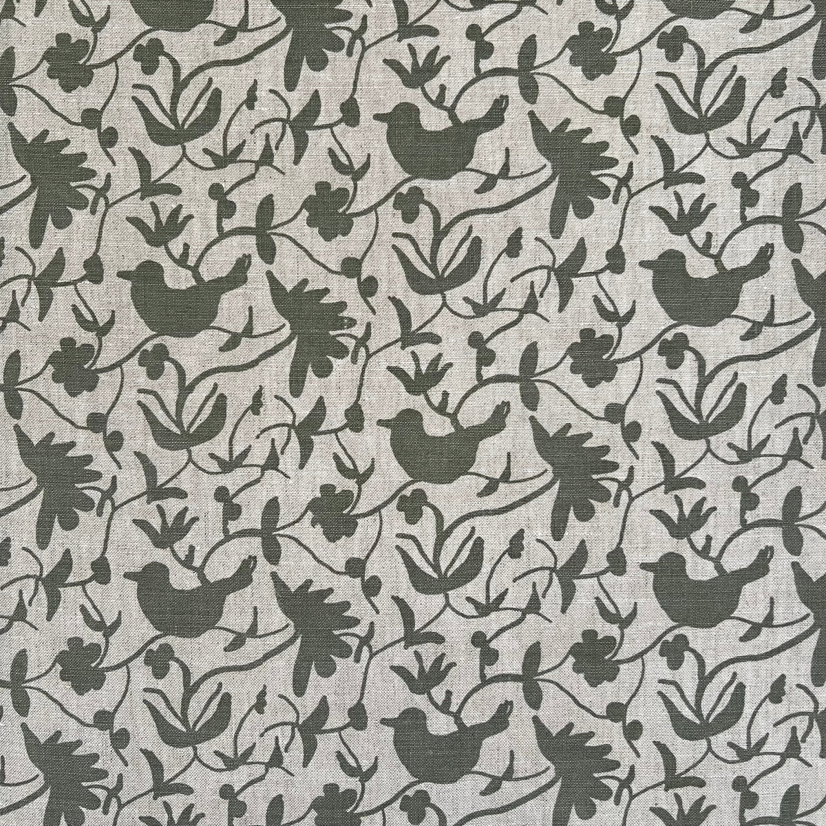 Artisan-printed Eliza textile — a lyrical blend of flowers and perched birds, inspired by nature and crafted for elevated interiors.