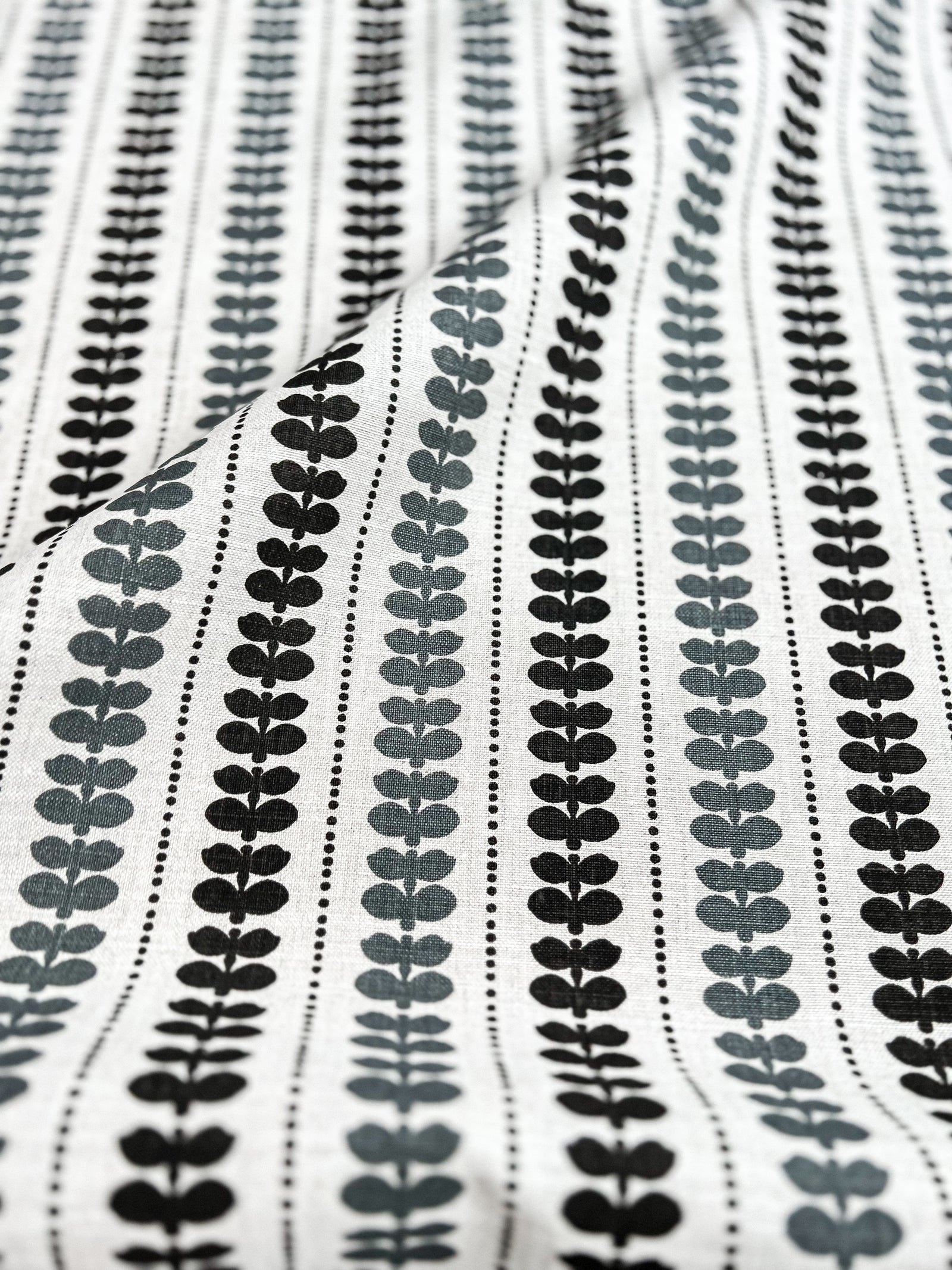 Elodie pattern by Greige Textiles — a hand-drawn floral stripe printed on Belgian linen, offering a modern take on a classic motif. Azure and Pepper on Oatmeal