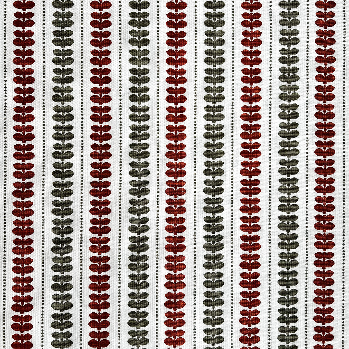 Greige Textiles’ Elodie design — a refined floral stripe that brings movement and softness to drapery, upholstery, and custom accents. Orange and green