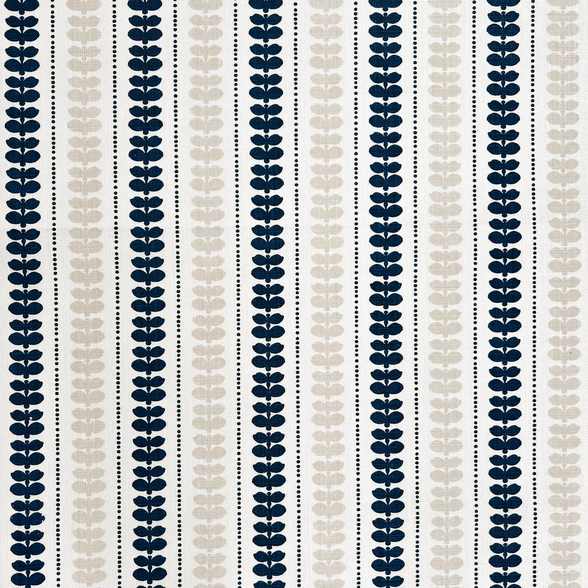 Artisan screen-printed linen with Elodie’s floral stripe design — delicate botanical elements arranged in a subtle, repeating rhythm. Blue and white stripe