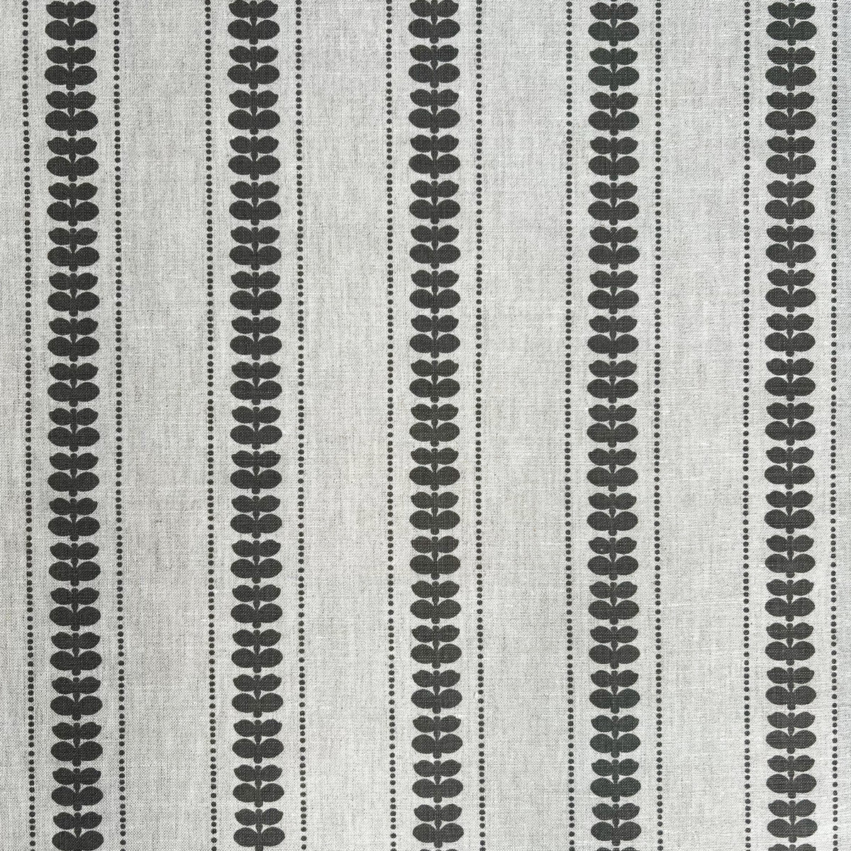 Artisan screen-printed linen with Elodie’s floral stripe design — delicate botanical elements arranged in a subtle, repeating rhythm.