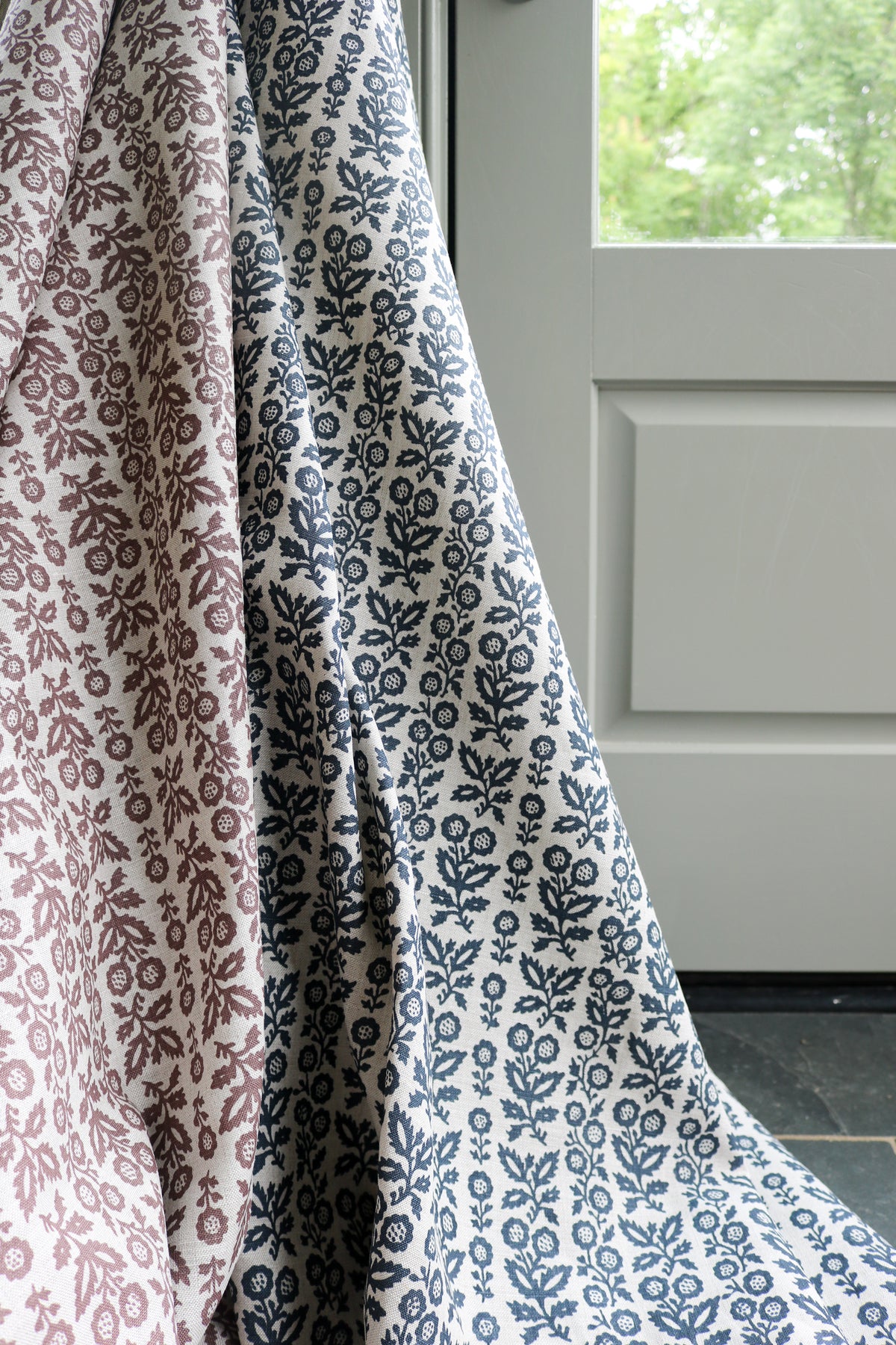 Clementine by  Greige Textiles￼ features a delicate, vintage-inspired pattern drawn from the cover of a rare book discovered along Portobello Road. Its refined composition evokes understated history and heirloom charm, bringing layered character and quiet elegance to drapery, upholstery, and thoughtfully designed interiors. Explore the full collection online.