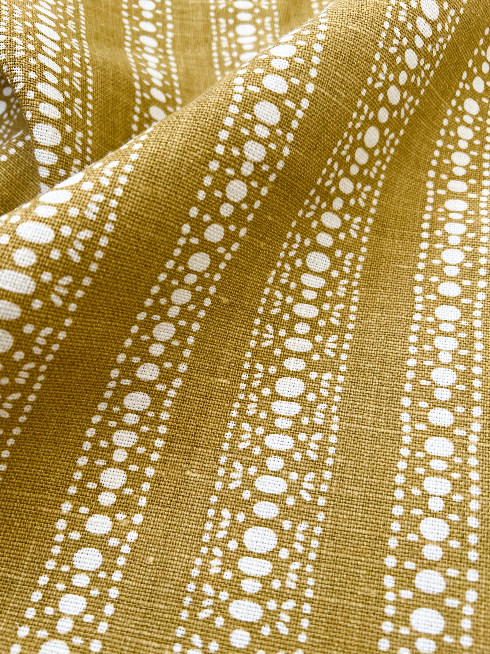 Bold, playful, and printed by hand—Greige Textiles’ linen designs bring your space to life. Visit us to explore. dotted stripe pattern 