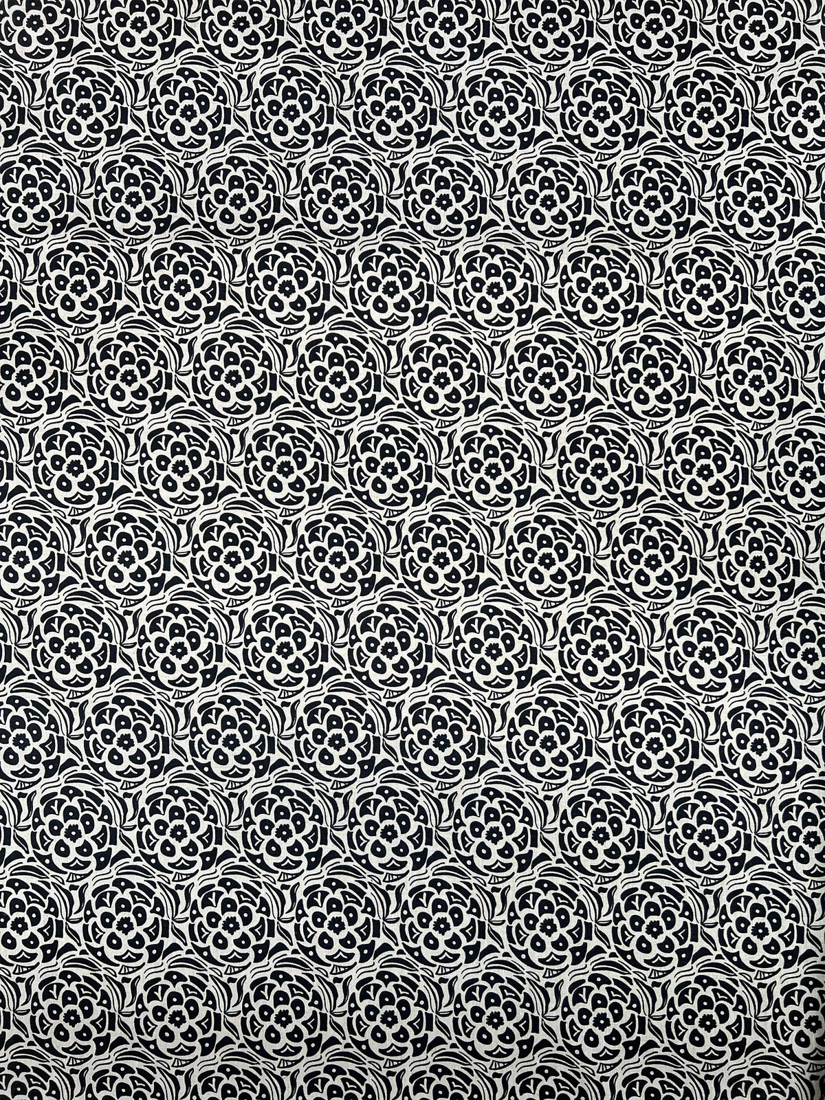 Artisan screen-printed linen showcasing the Ida motif — subtle botanical texture perfect for upholstery, drapery, or custom pillows. Indigo on linen