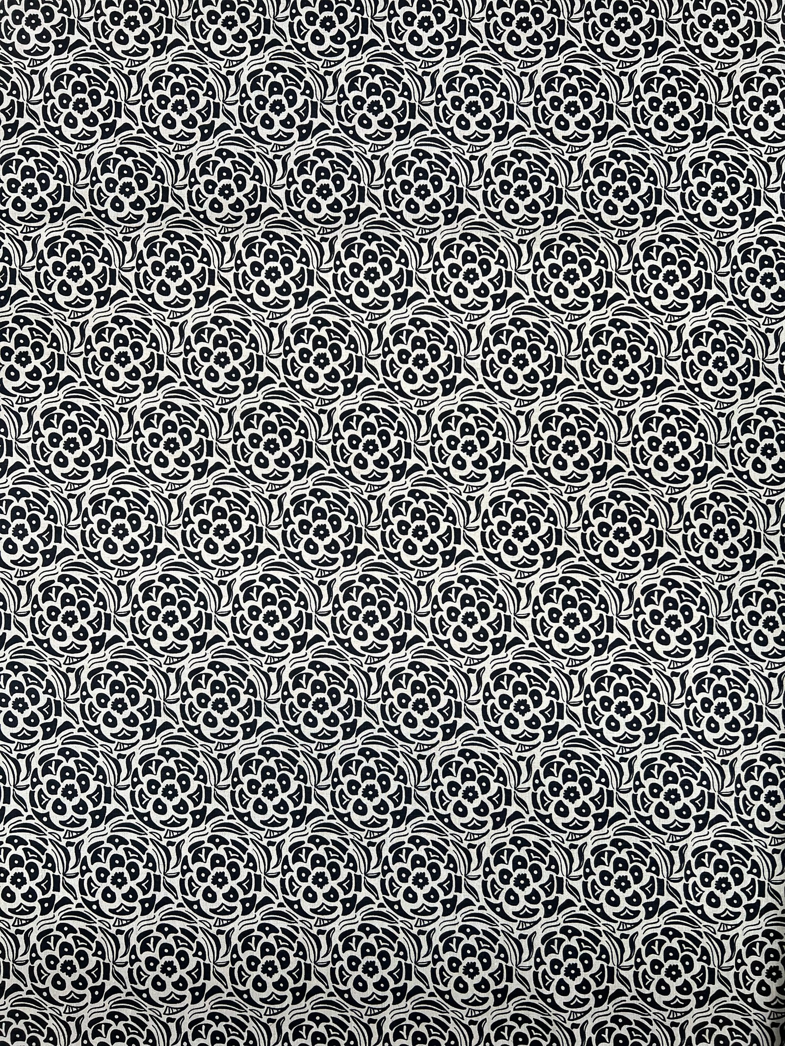 Artisan screen-printed linen showcasing the Ida motif — subtle botanical texture perfect for upholstery, drapery, or custom pillows.