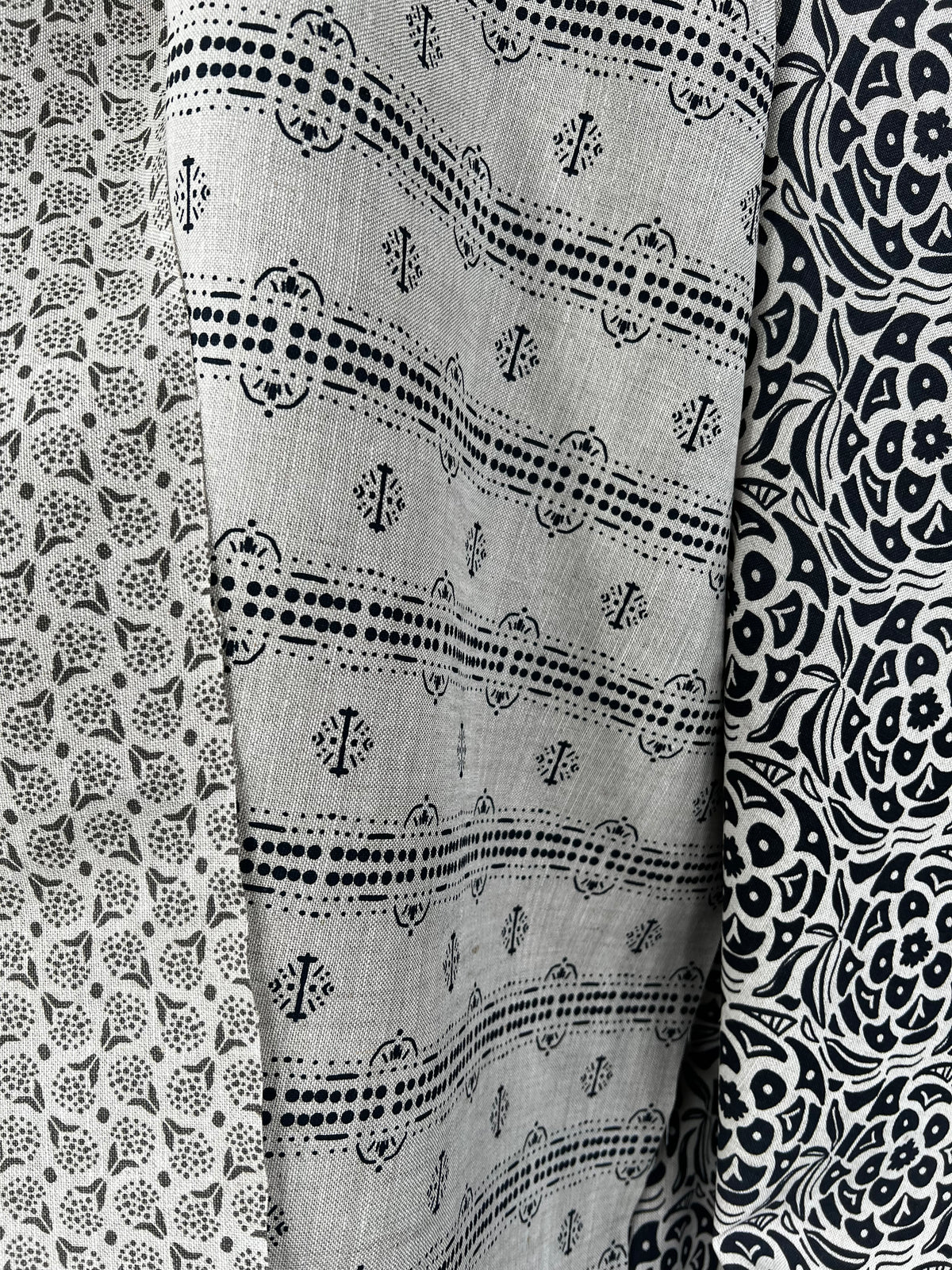 Floral geometric, and dot pattern greige textiles to the trade hand printed textiles grey and oatmeal linen fabric for  interior designers stripe