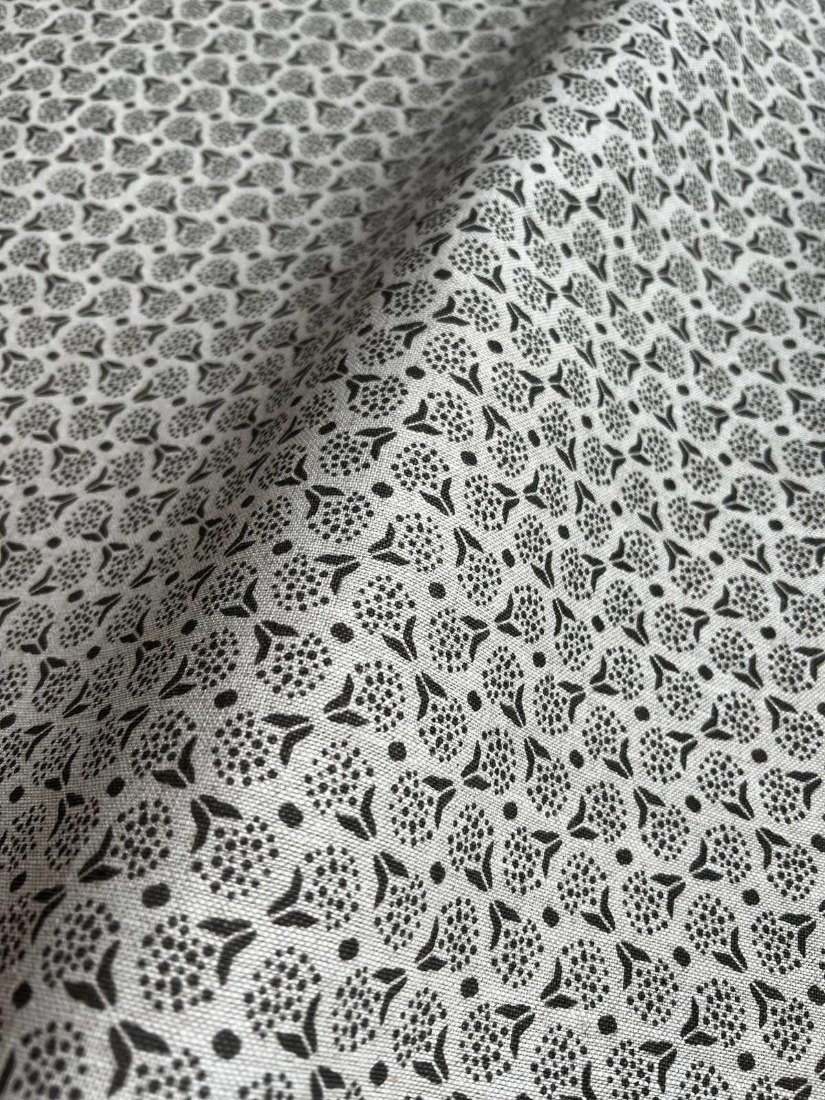 Floral geometric, and dot pattern greige textiles to the trade hand printed textiles grey and oatmeal linen fabric for  interior designers