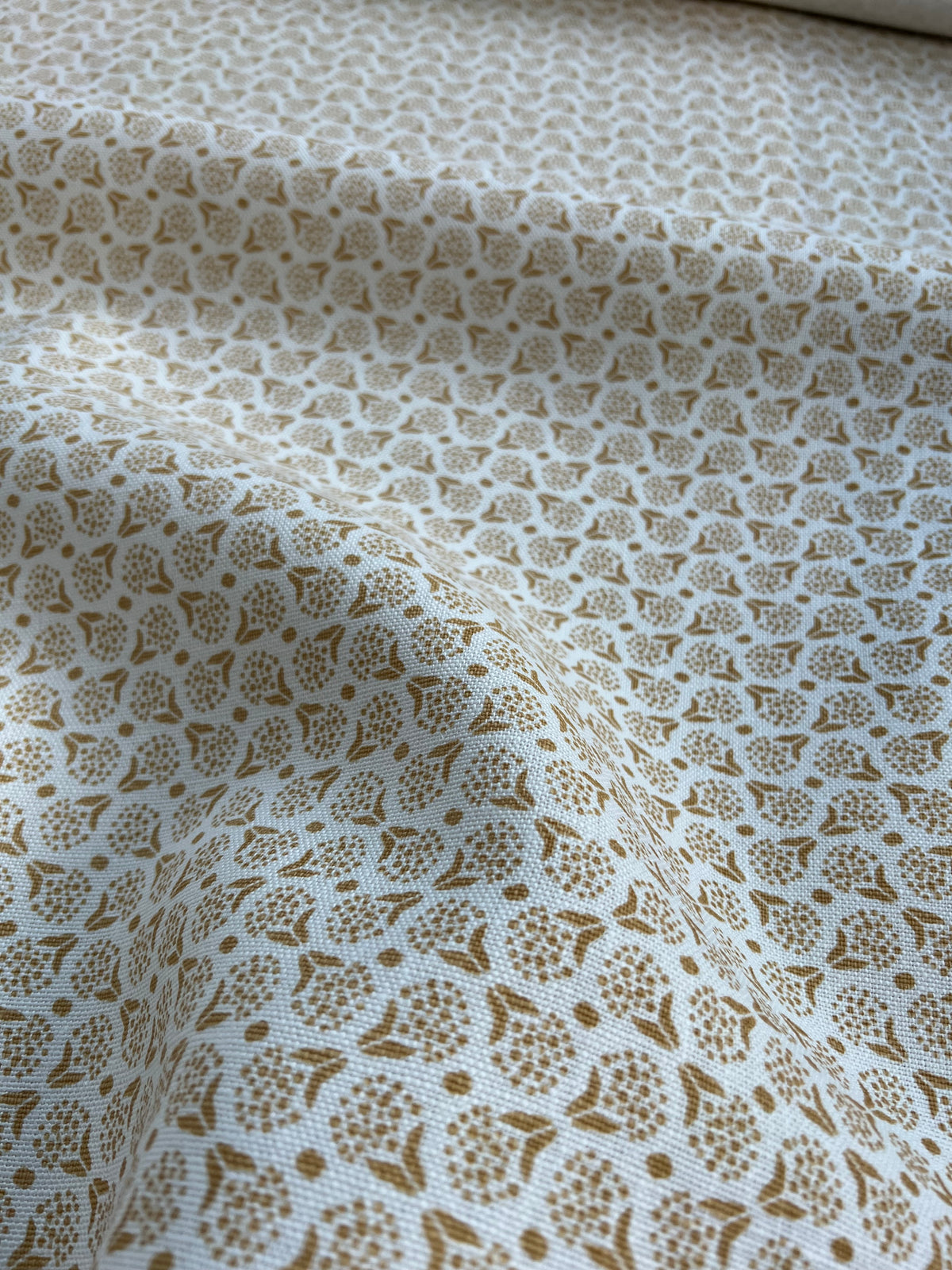 Botanical-inspired fabric in a soft floral dot motif, screen printed on artisanal linen for designer use greige textiles wheat yellow