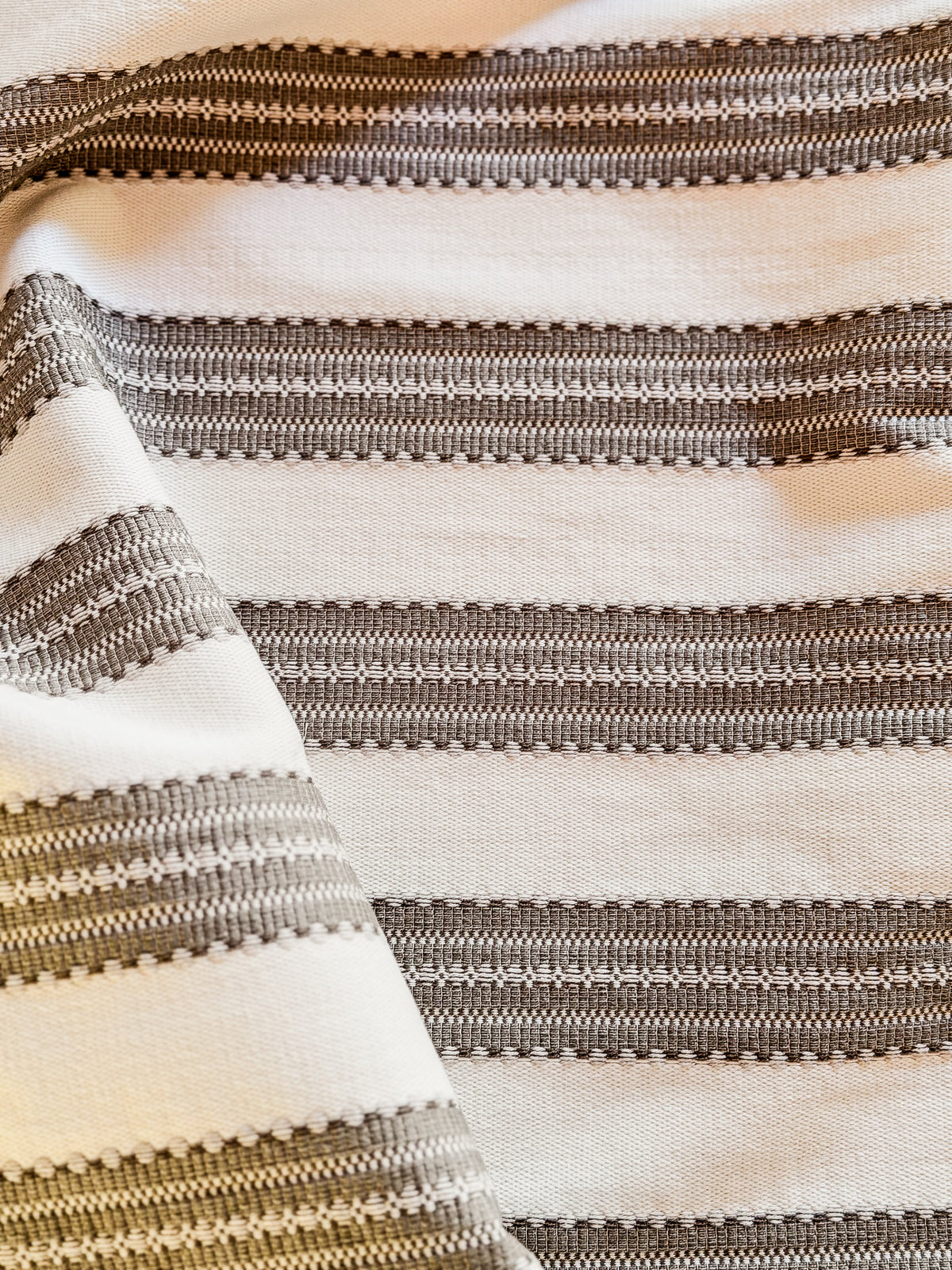 landry stripe by greige textiles is inspired by a vintage French linen mattress ticking discovered in the South of France, reimagined as a durable woven for today's interior upholstery needs