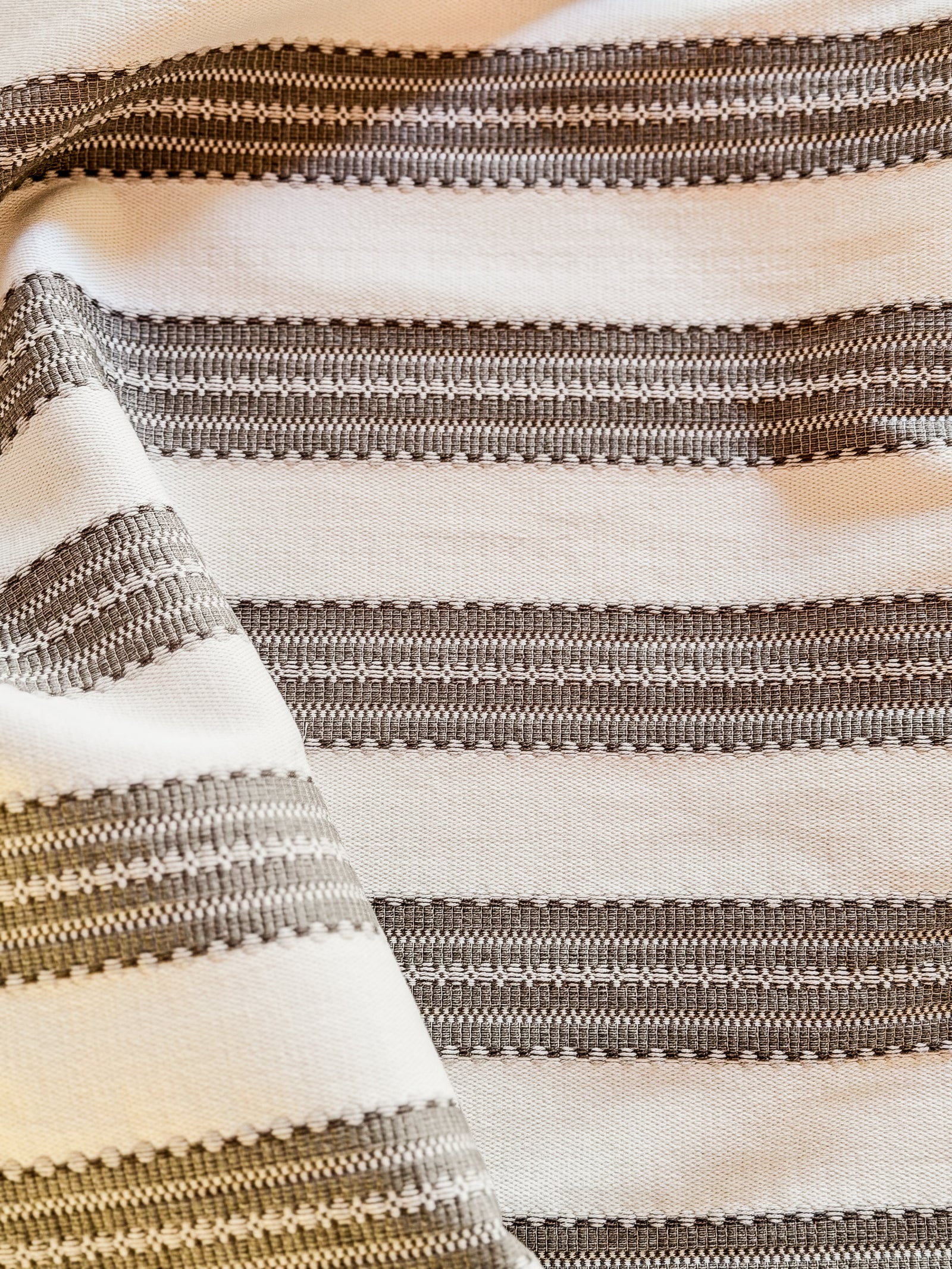 landry stripe by greige textiles is inspired by a vintage French linen mattress ticking discovered in the South of France, reimagined as a durable woven for today's interior upholstery needs
