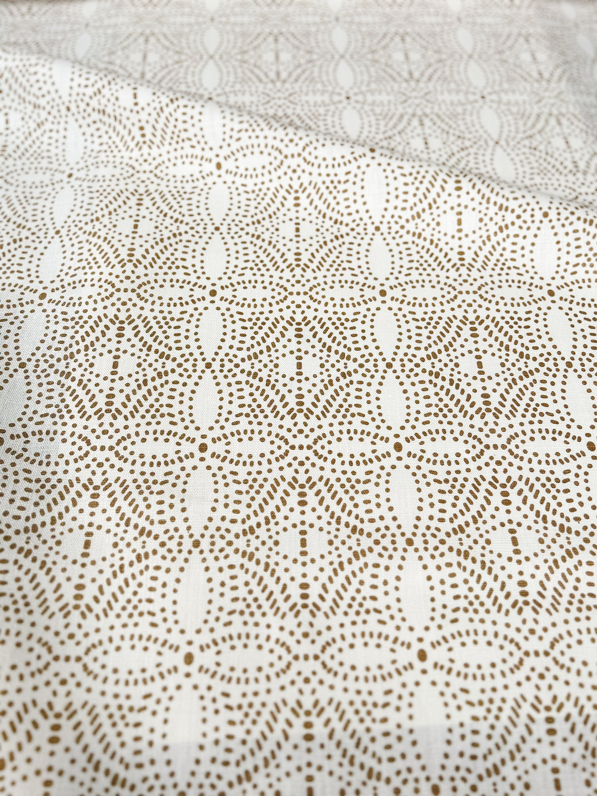 Nell fabric by Greige Textiles captures the essence of new foliage and warm light, a designer favorite for nature-inspired interiors and layered textile schemes