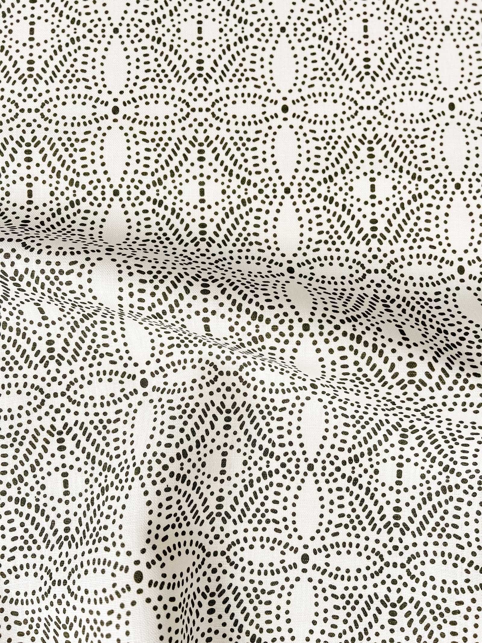 Nell fabric by Greige Textiles, perfect for custom Roman shades—offering a soft, natural pattern inspired by spring light and foliage for elevated window treatments