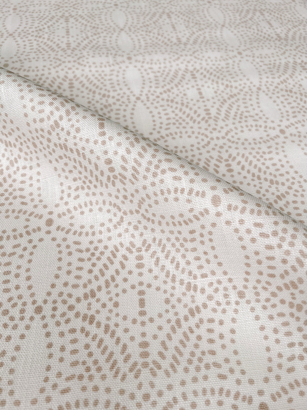 Nell fabric by Greige Textiles showcasing a soft, organic pattern inspired by spring foliage and sunlight—perfect for custom drapery, upholstery, and serene interior design.