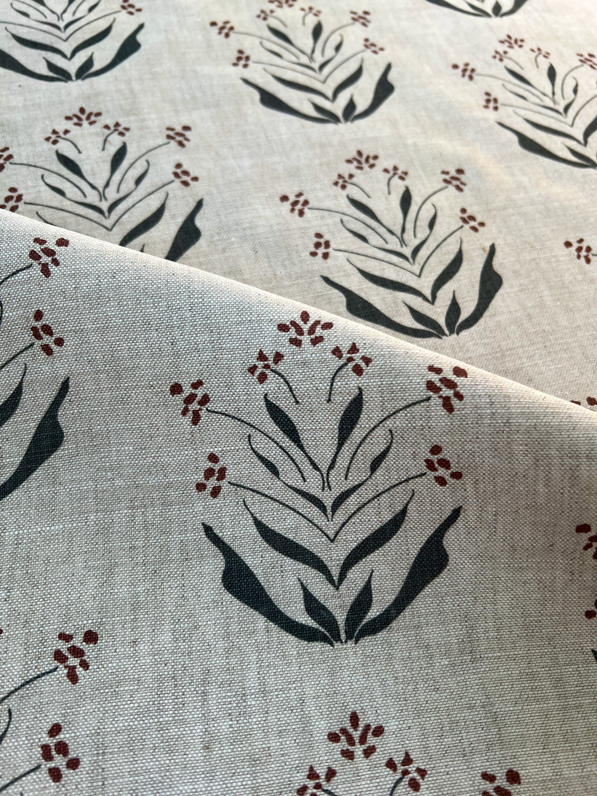 floral, botanical,  pattern greige textiles hand printed textiles to the interior Design trade Greige Textiles’ Paige fabric adds gentle botanical charm to accent chairs—hand-printed with the grace of early Zinnia blossoms