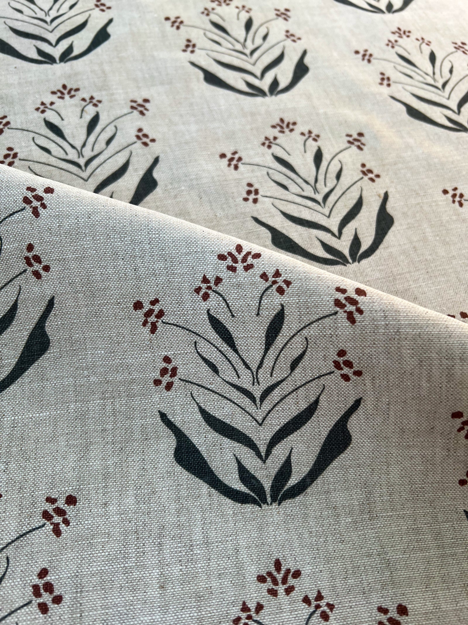 floral, botanical,  pattern greige textiles hand printed textiles to the trade Greige Textiles’ Paige fabric adds gentle botanical charm to accent chairs—hand-printed with the grace of early Zinnia blossoms
