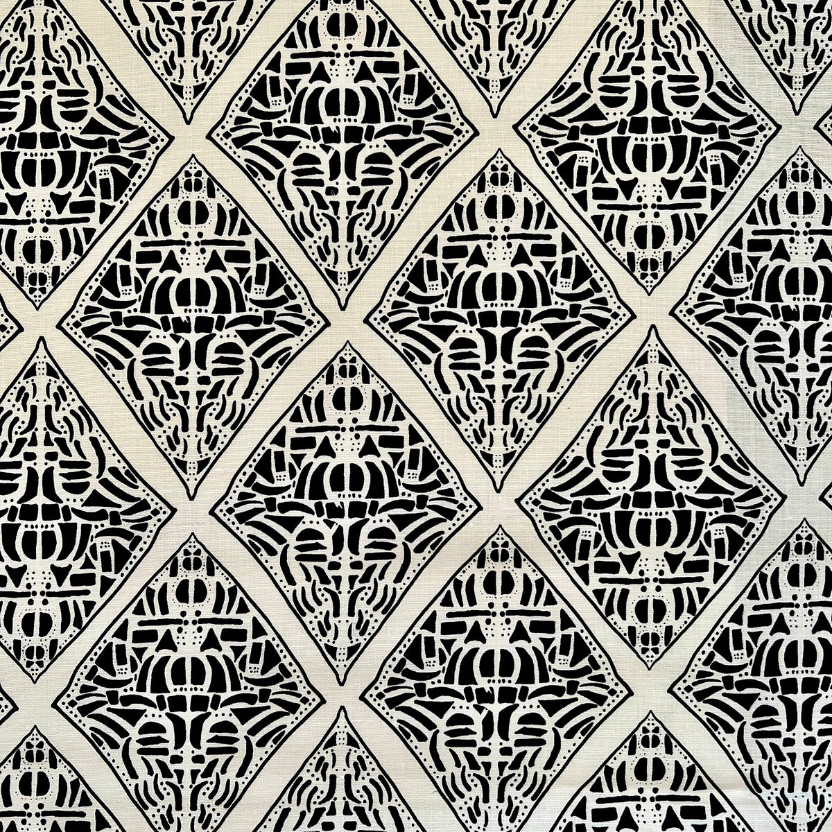 Greige Textiles Rhodes pattern—hand-printed textile inspired by the bold geometry of Polynesian artistry, perfect for curated interior design.