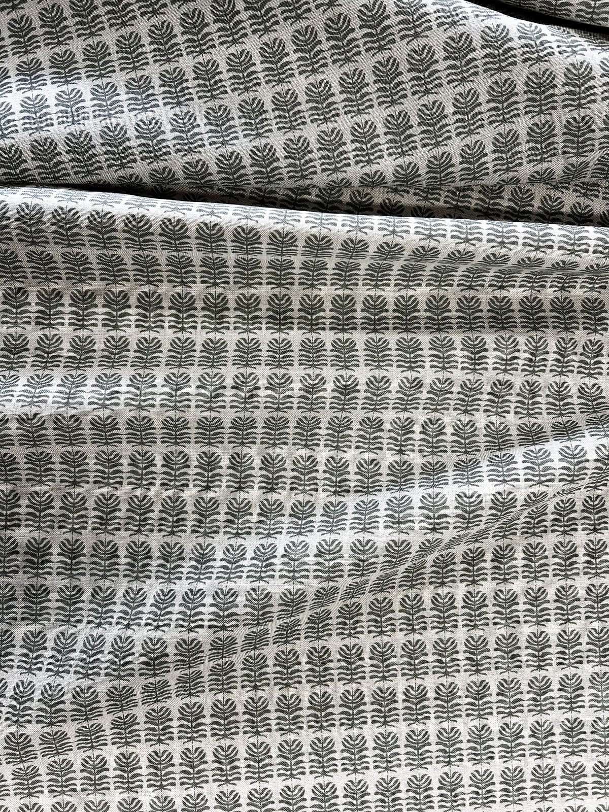 Greige Textiles Clara fabric — a light, botanical floral motif with heritage influences, hand-printed on Belgian linen for timeless interiors