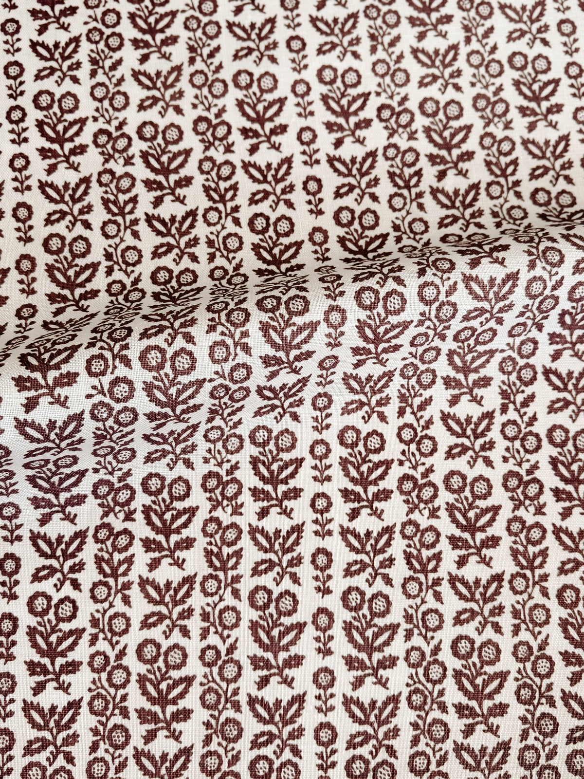 Greige Textiles Clementine from Collection 12, a vintage-inspired decorative fabric featuring a subtle storied pattern with timeless classic appeal