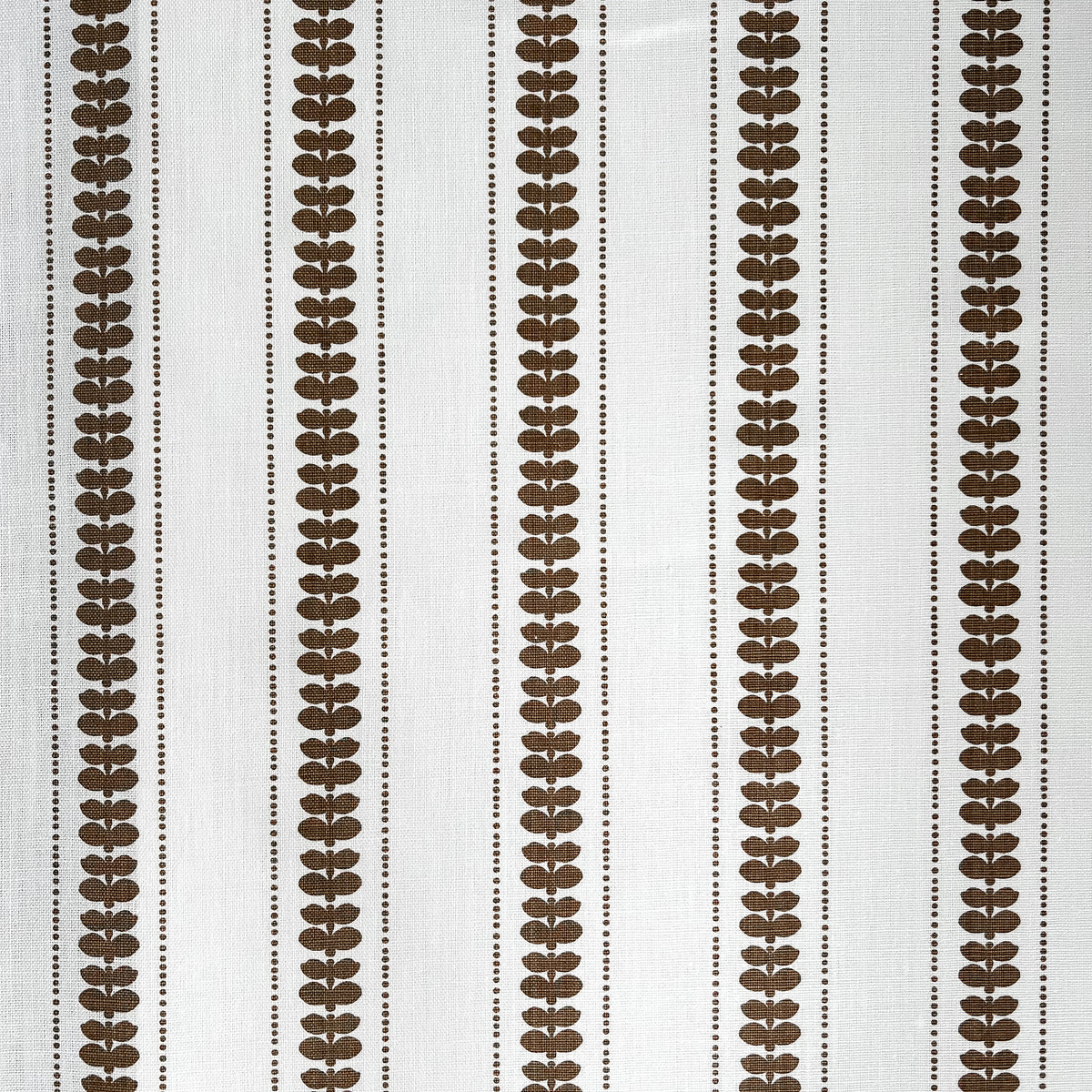 Greige Textiles’ Elodie design — a refined floral stripe that brings movement and softness to drapery, upholstery, and custom accents. Gold and oyster