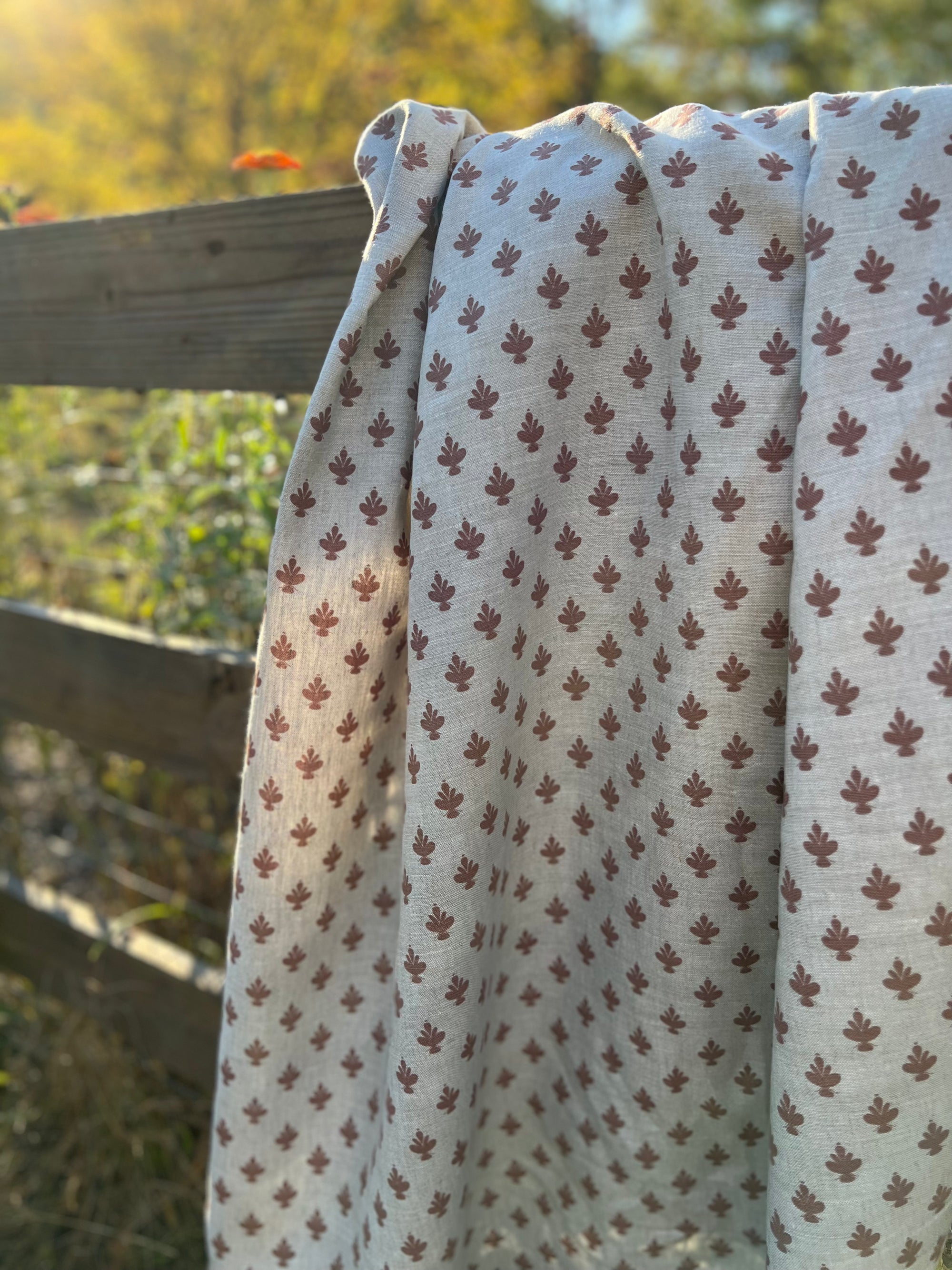 Adeline floral pattern — a delicate, artisan-printed design featuring magnolia blossoms, perfect for sophisticated interiors. Interior design to the trade.