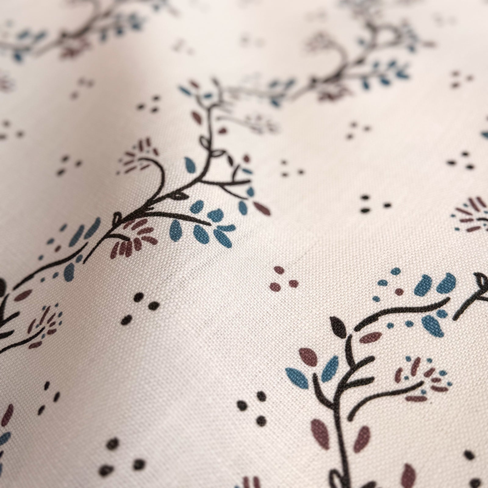 Greige Textiles Collection 12 Arden decorative fabric showcasing elegant vine motifs inspired by clematis growing over aged stone walls