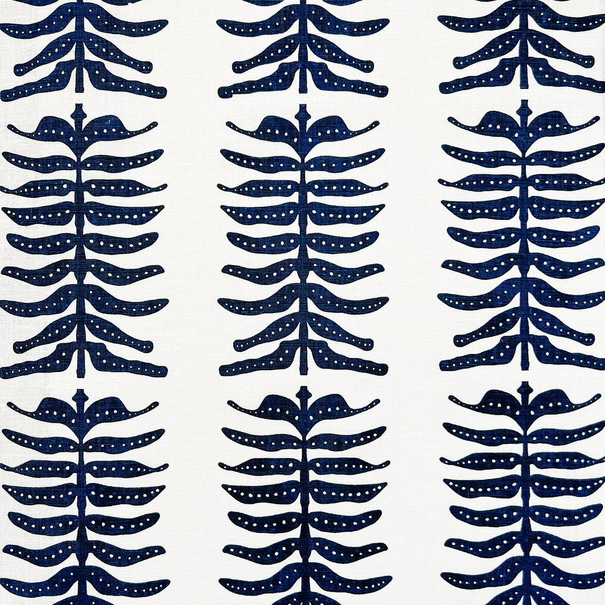 greige textiles Odette Fabric Indigo on Oyster. Elevate your home with Greige Textiles&#39; lively collection of hand screen-printed linen fabrics and artisan wallpapers.