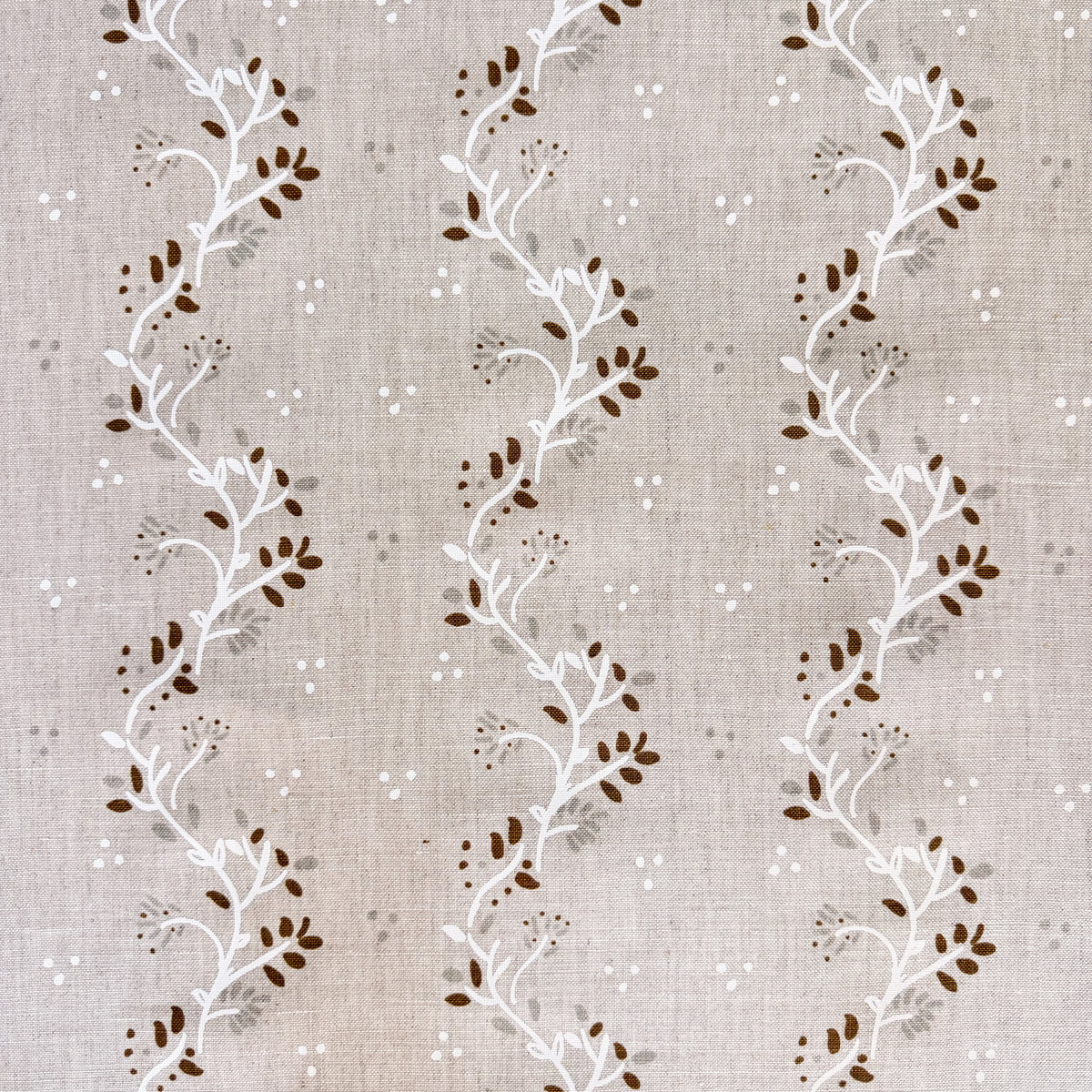 Arden textile by Greige Textiles featuring flowing botanical clematis vines with soft organic movement and natural garden inspiration