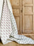 Explore Greige Textiles’ colorful linen fabrics and wallpapers—made by hand for curated interior design.