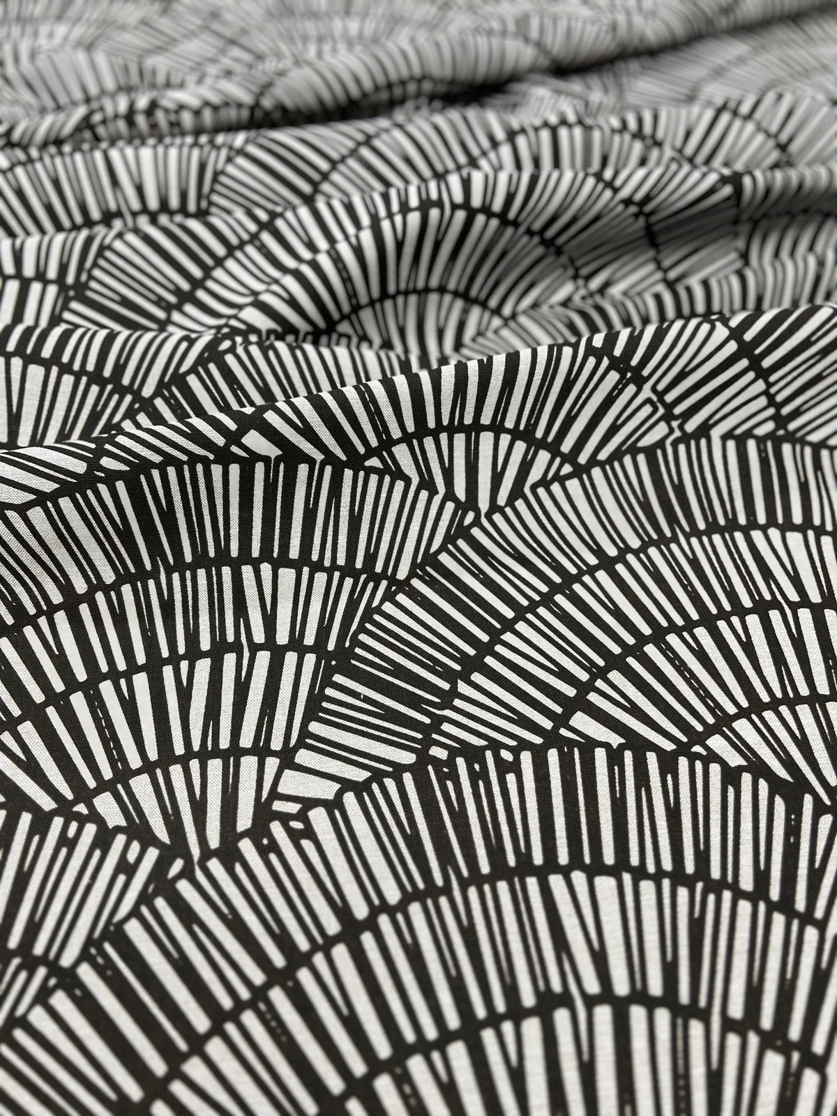 Bold, playful, and printed by hand—Greige Textiles’ linen designs bring your space to life. Visit us to explore.