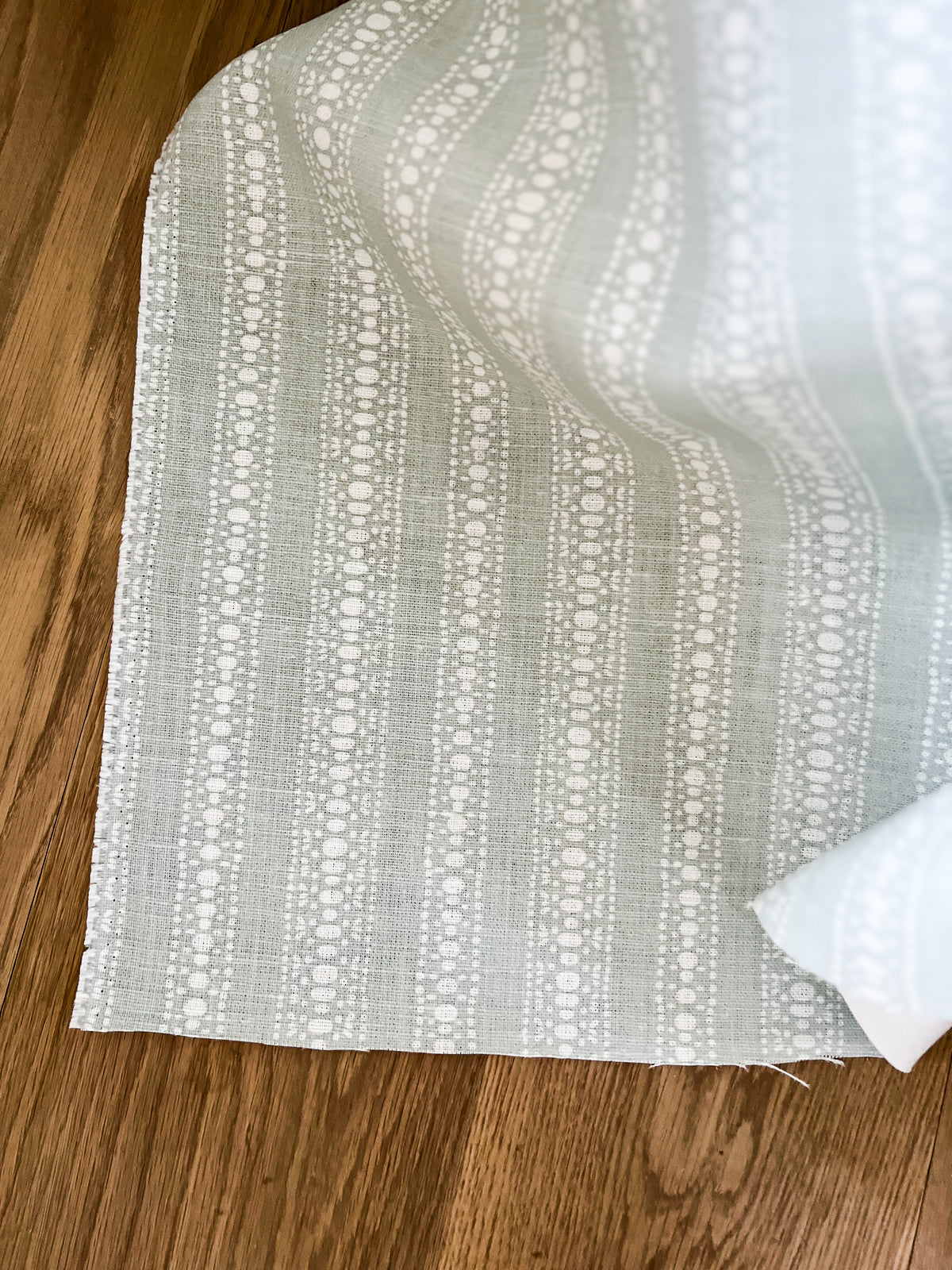 Explore Greige Textiles’ colorful linen fabrics and wallpapers—made by hand for curated interior design.