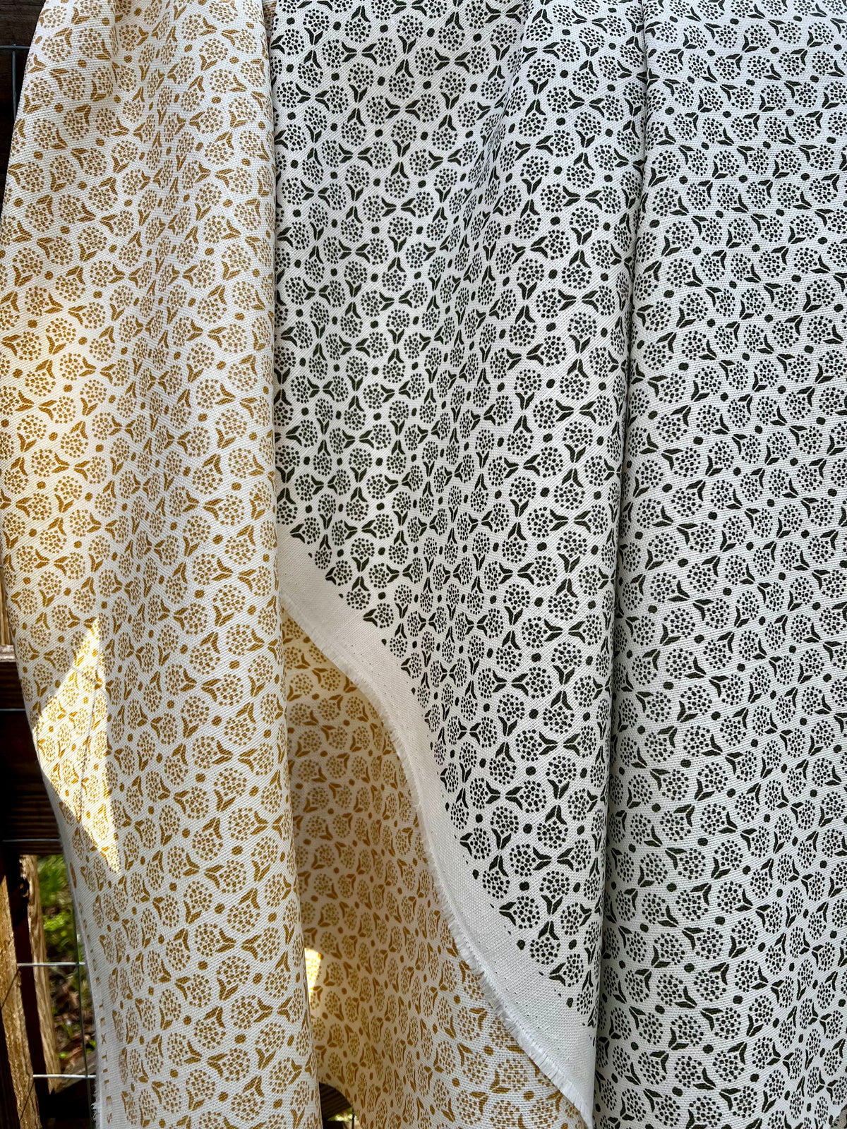 Shop Greige Textiles’ hand screen-printed linens and wallpapers—perfect for bespoke interior design projects.