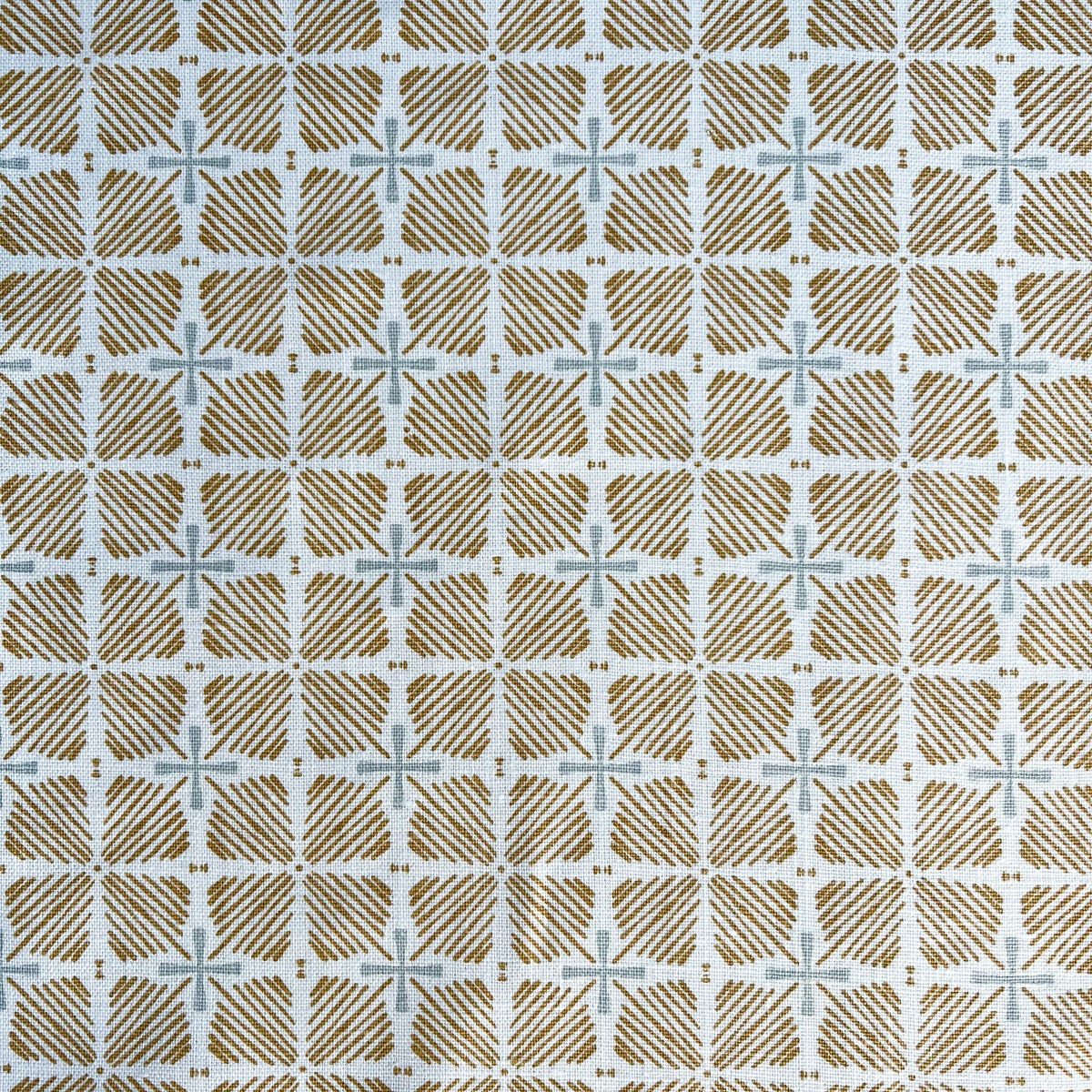 Greige Textiles blends bold color and heritage design in hand-printed linen fabrics and wallpapers—crafted for thoughtful interiors.