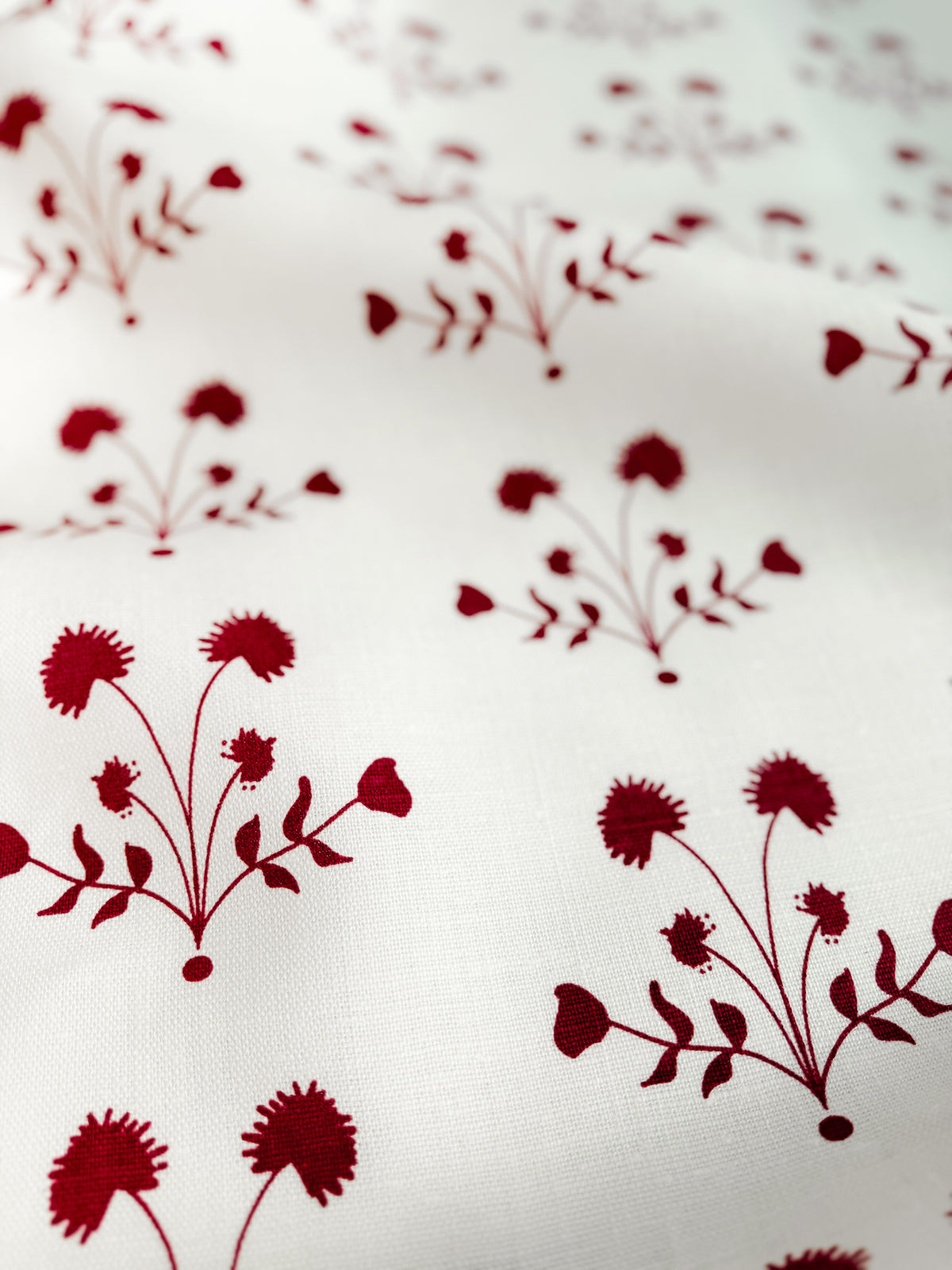 Add depth and character to your home with Greige Textiles’ playful yet timeless designs screen printed by hand on natural linen. greige textiles lisbet Red on Oyster.