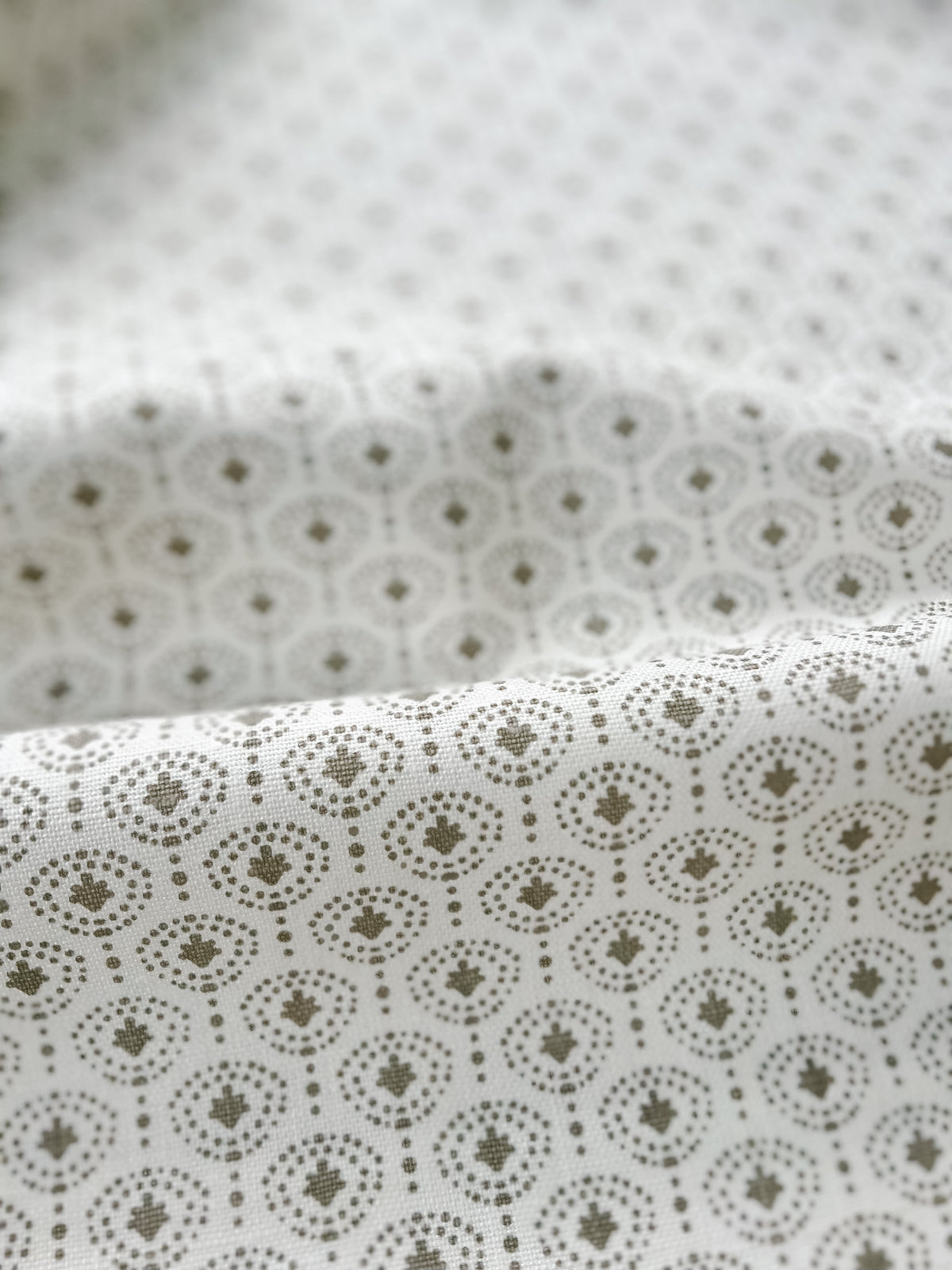 Shop Greige Textiles’ hand screen-printed linens and wallpapers—perfect for bespoke interior design projects.