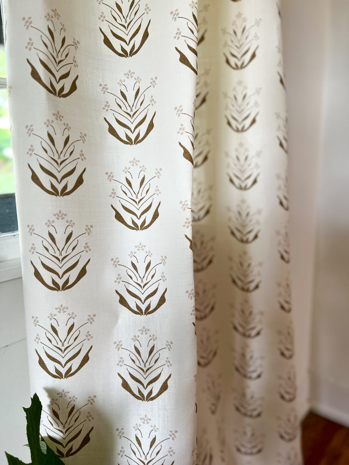 Greige Textiles&#39; Paige pattern: a hand-printed, mid-size floral design on natural linen, crafted for bespoke interior design applications including drapery, pillows, and upholstery