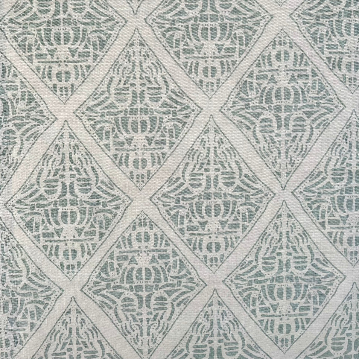 Greige Textiles Rhodes pattern—hand-printed textile inspired by the bold geometry of Polynesian artistry, perfect for curated interior design.