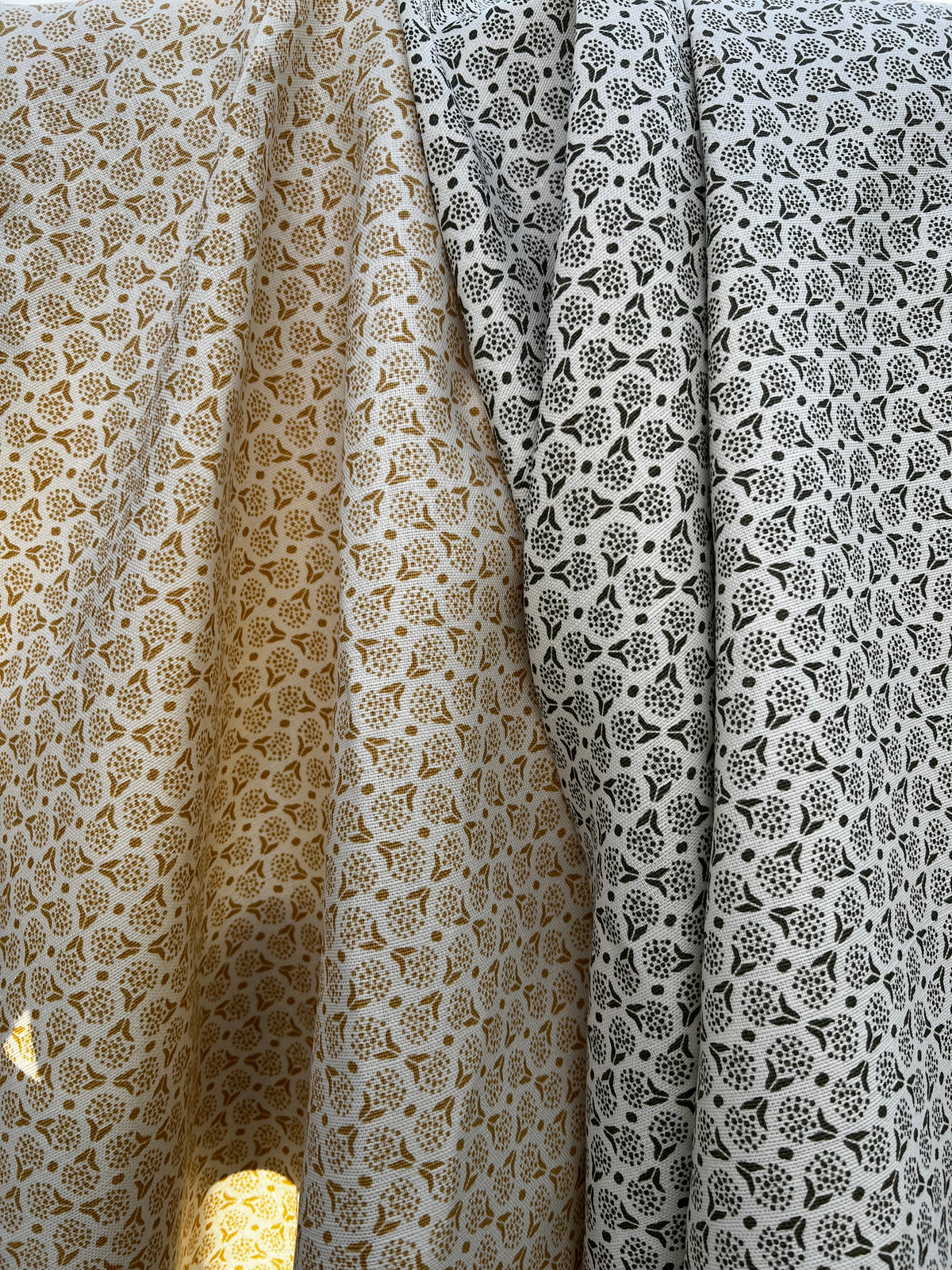 Botanical-inspired fabric in a soft floral dot motif, screen printed on artisanal linen for designer use greige textiles wheat yellow, olive green