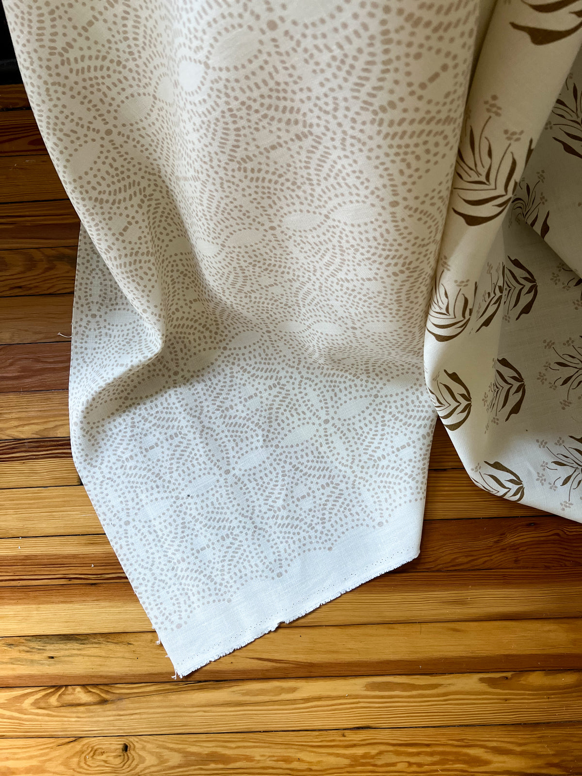 Nell by Greige Textiles offers a flowing, light-filtering pattern for custom drapery—evoking spring foliage and soft sunlight for refined window treatments